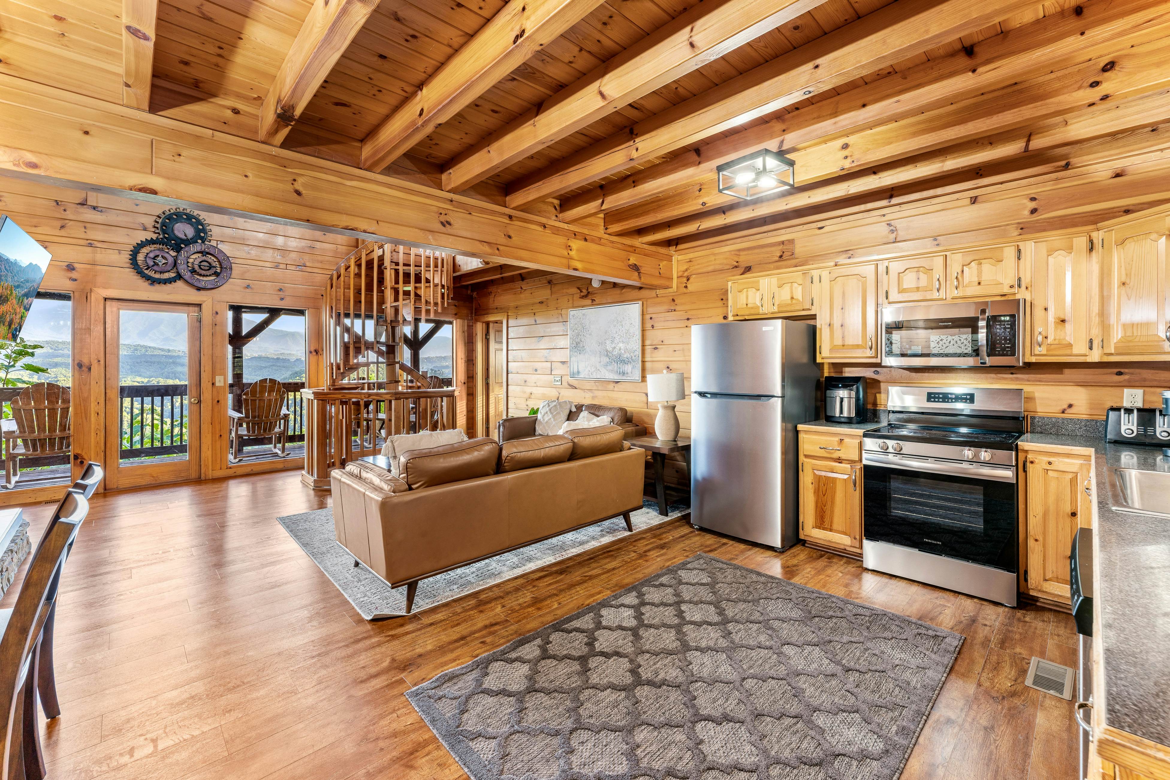 Rustic log cabin w/ Free Attraction Tickets, mountain views, hot tub, & games