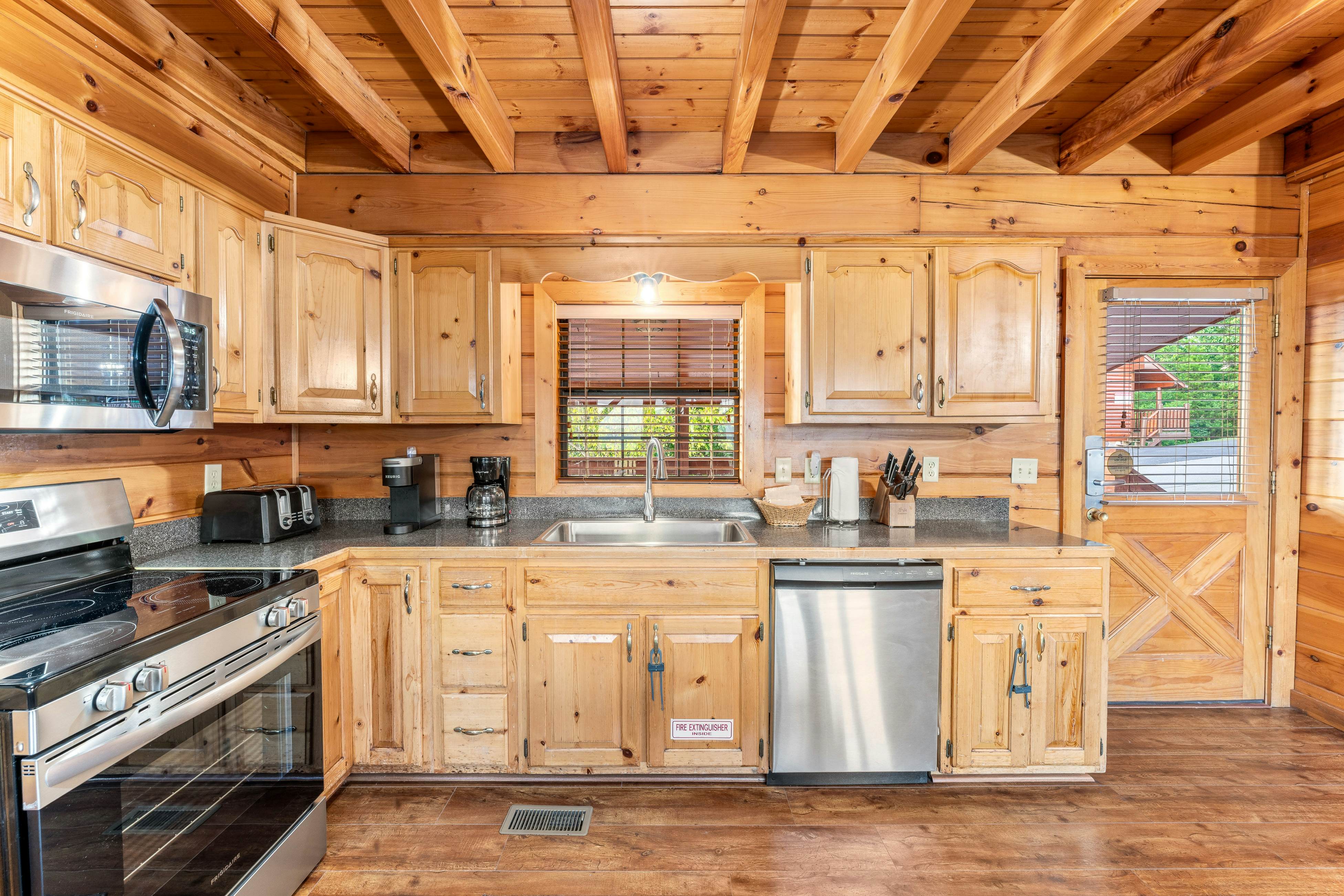 Rustic log cabin w/ Free Attraction Tickets, mountain views, hot tub, & games