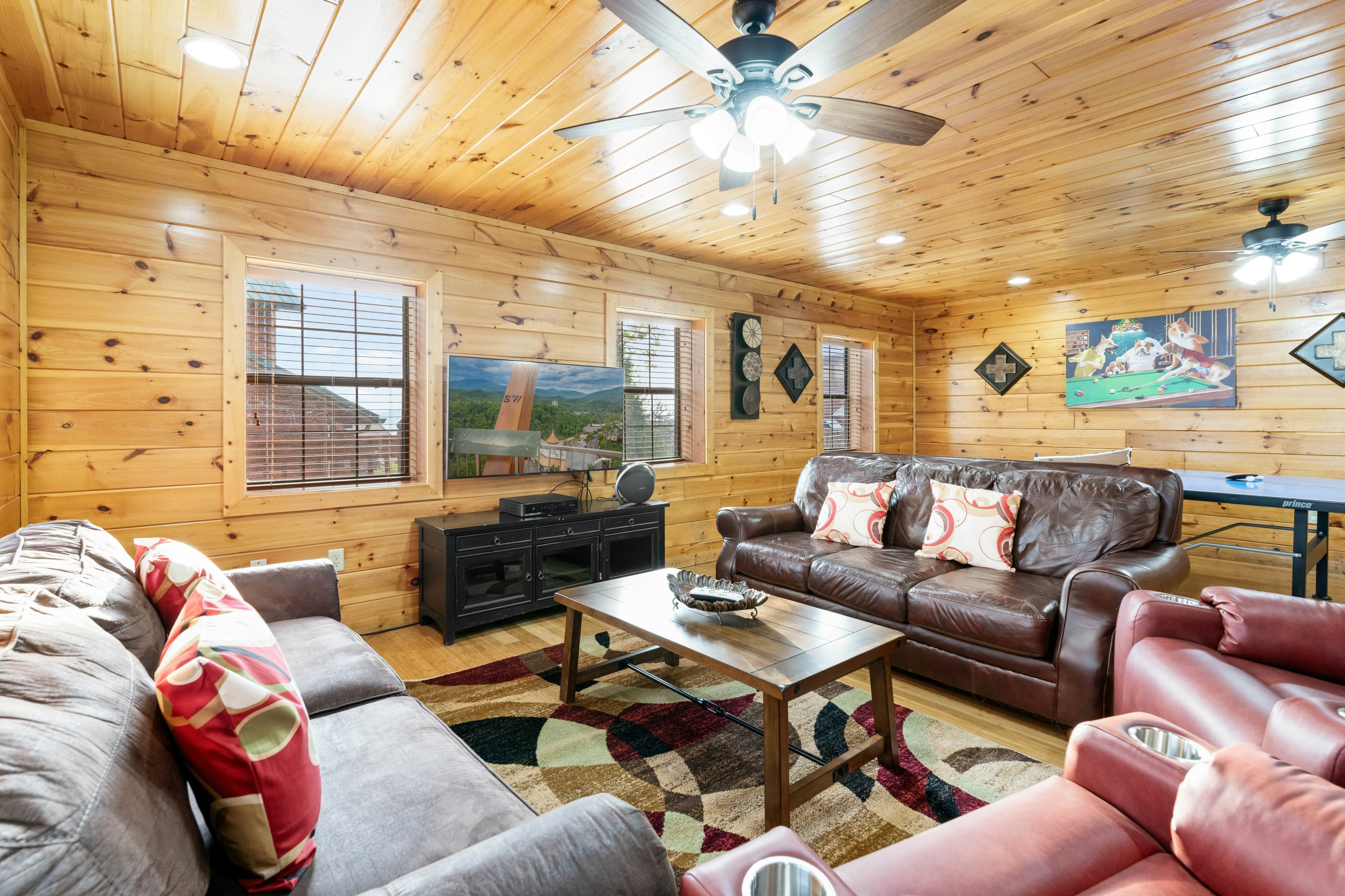 Rustic log cabin w/ Free Attraction Tickets, mountain views, hot tub, & games