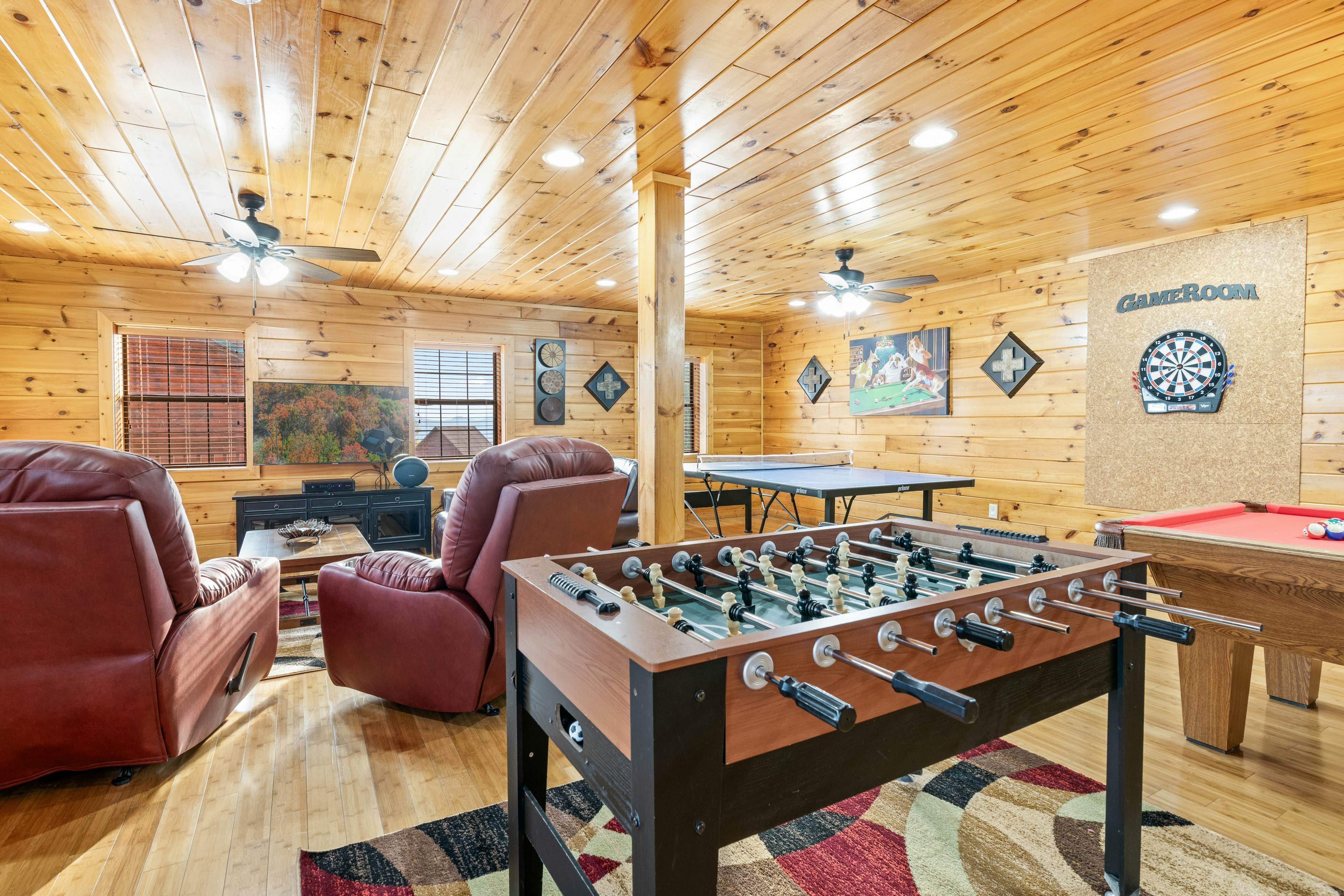 Rustic log cabin w/ Free Attraction Tickets, mountain views, hot tub, & games