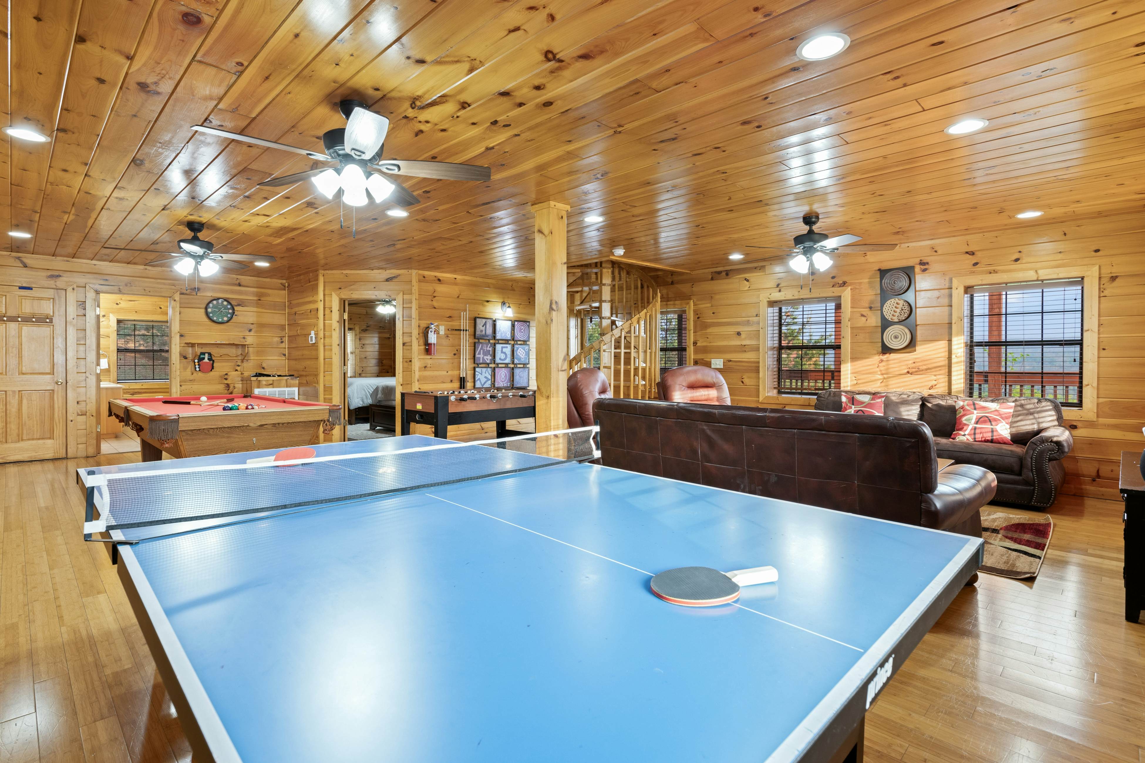 Rustic log cabin w/ Free Attraction Tickets, mountain views, hot tub, & games