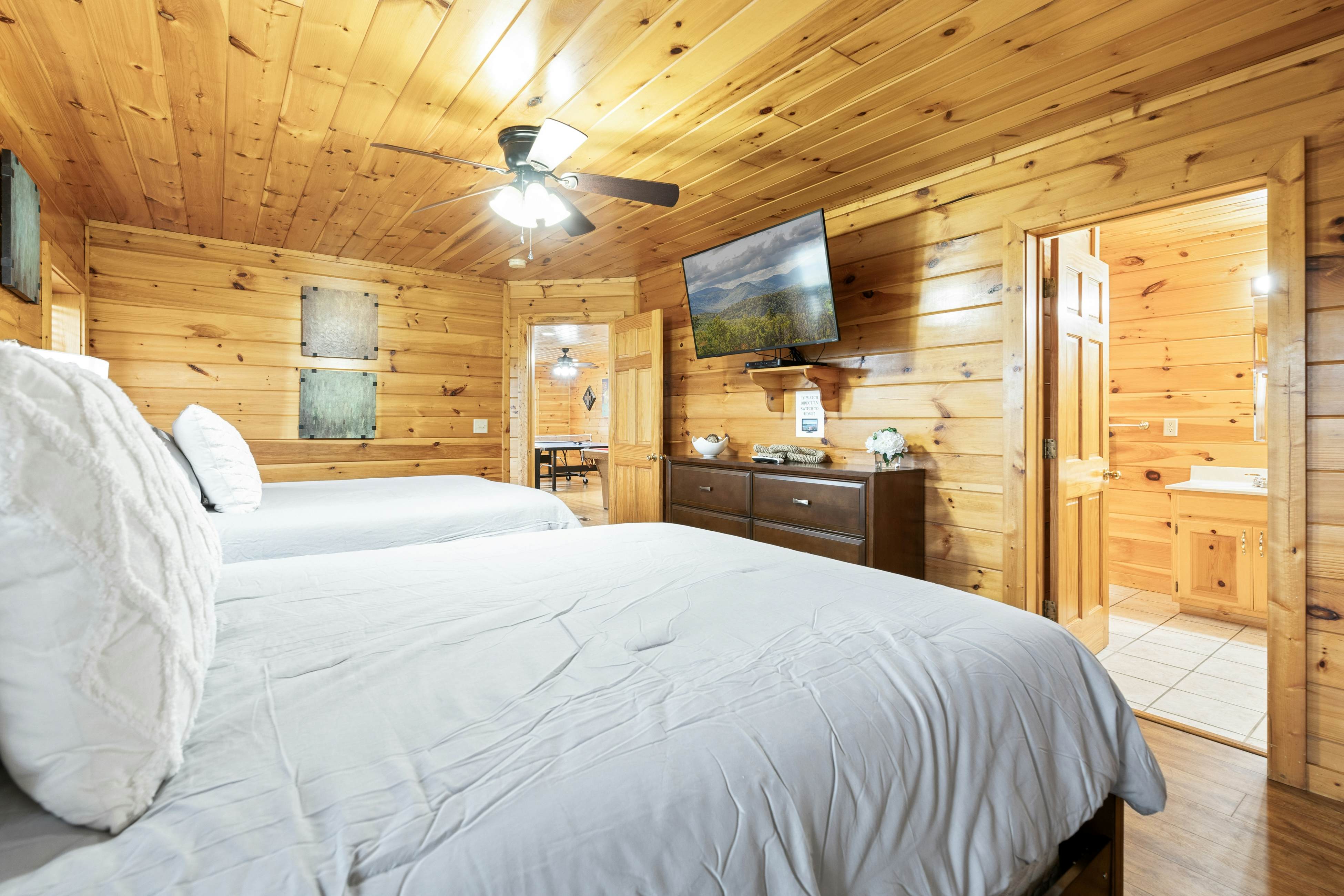 Rustic log cabin w/ Free Attraction Tickets, mountain views, hot tub, & games