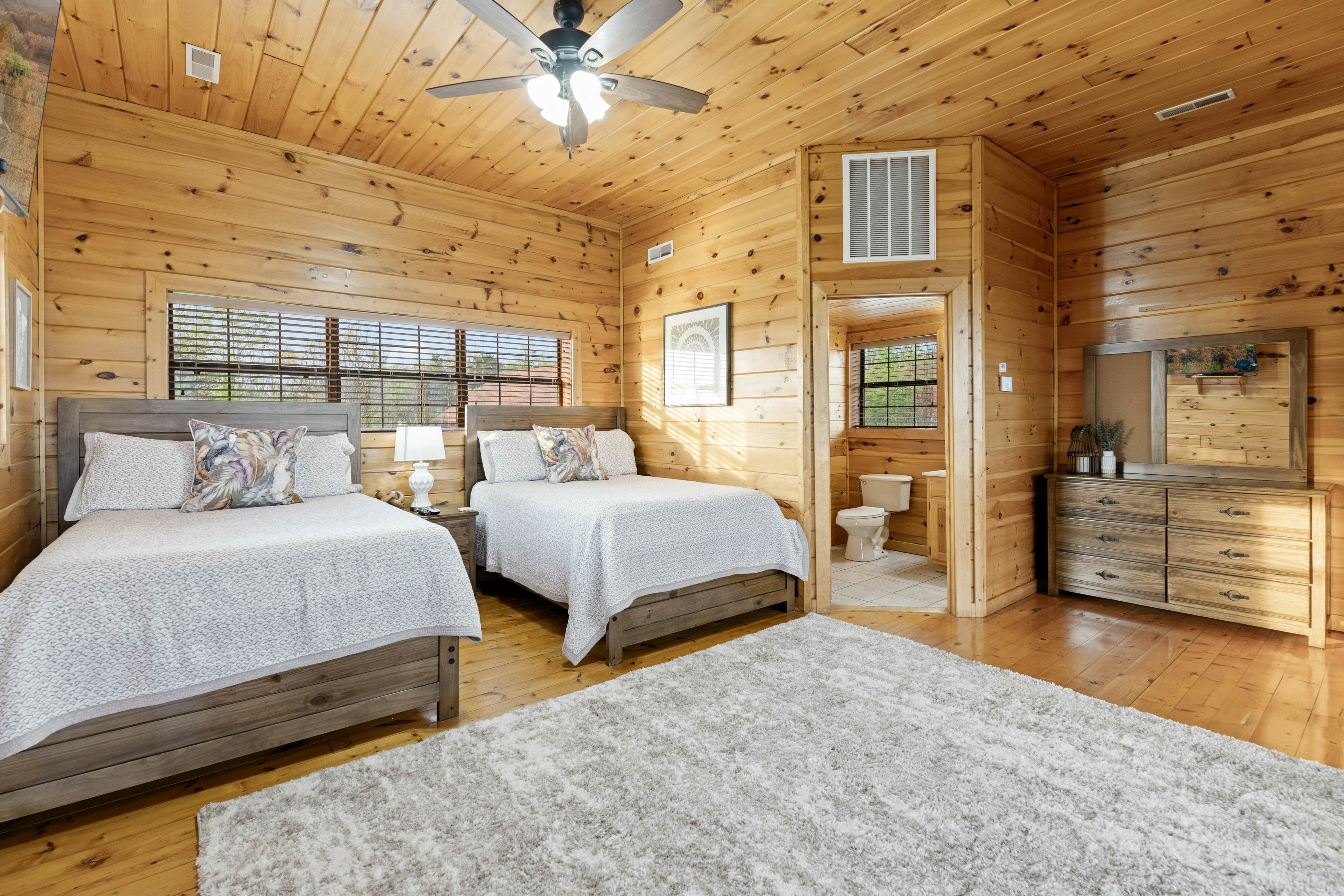 Rustic log cabin w/ Free Attraction Tickets, mountain views, hot tub, & games