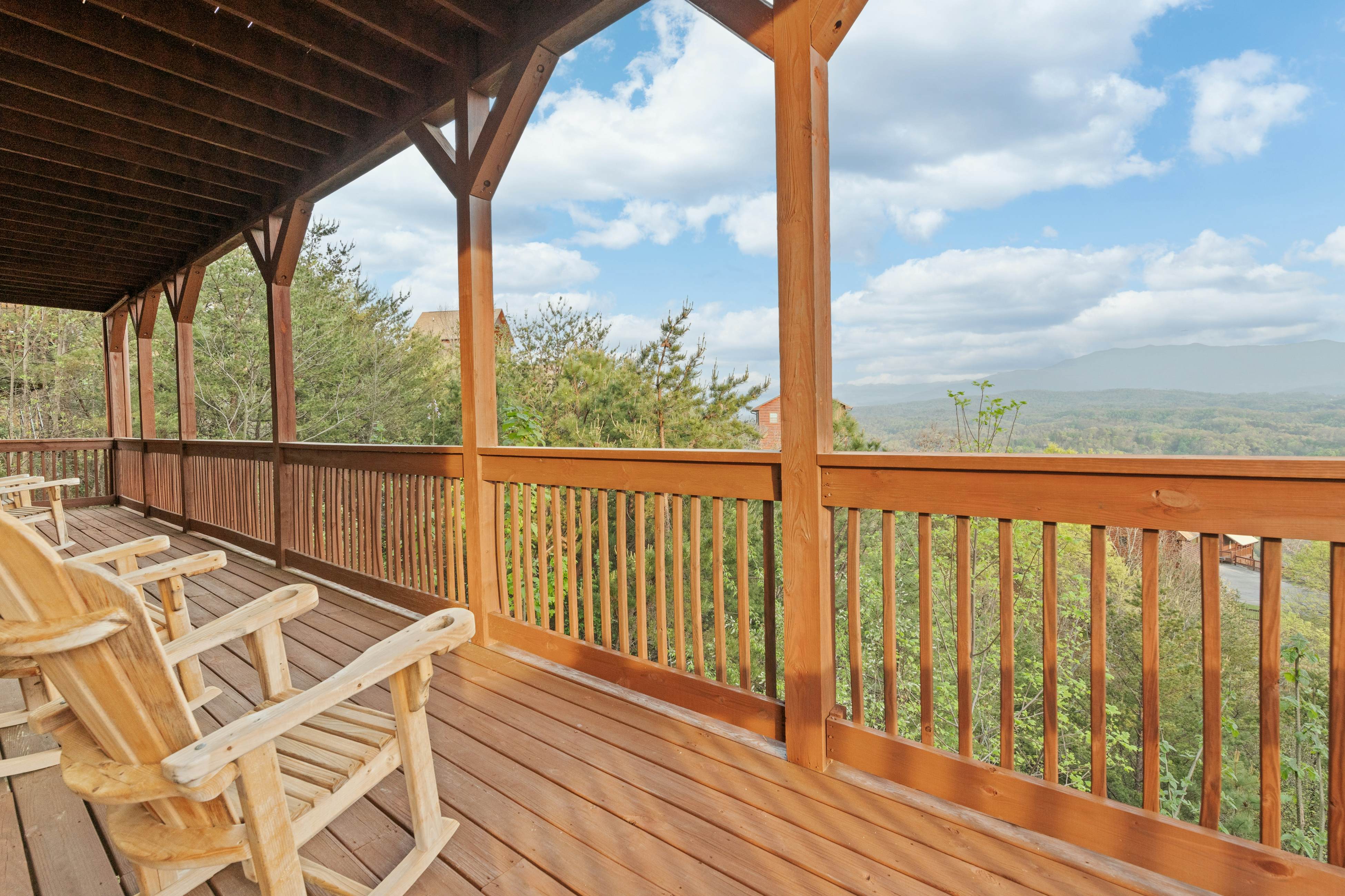 Rustic log cabin w/ Free Attraction Tickets, mountain views, hot tub, & games