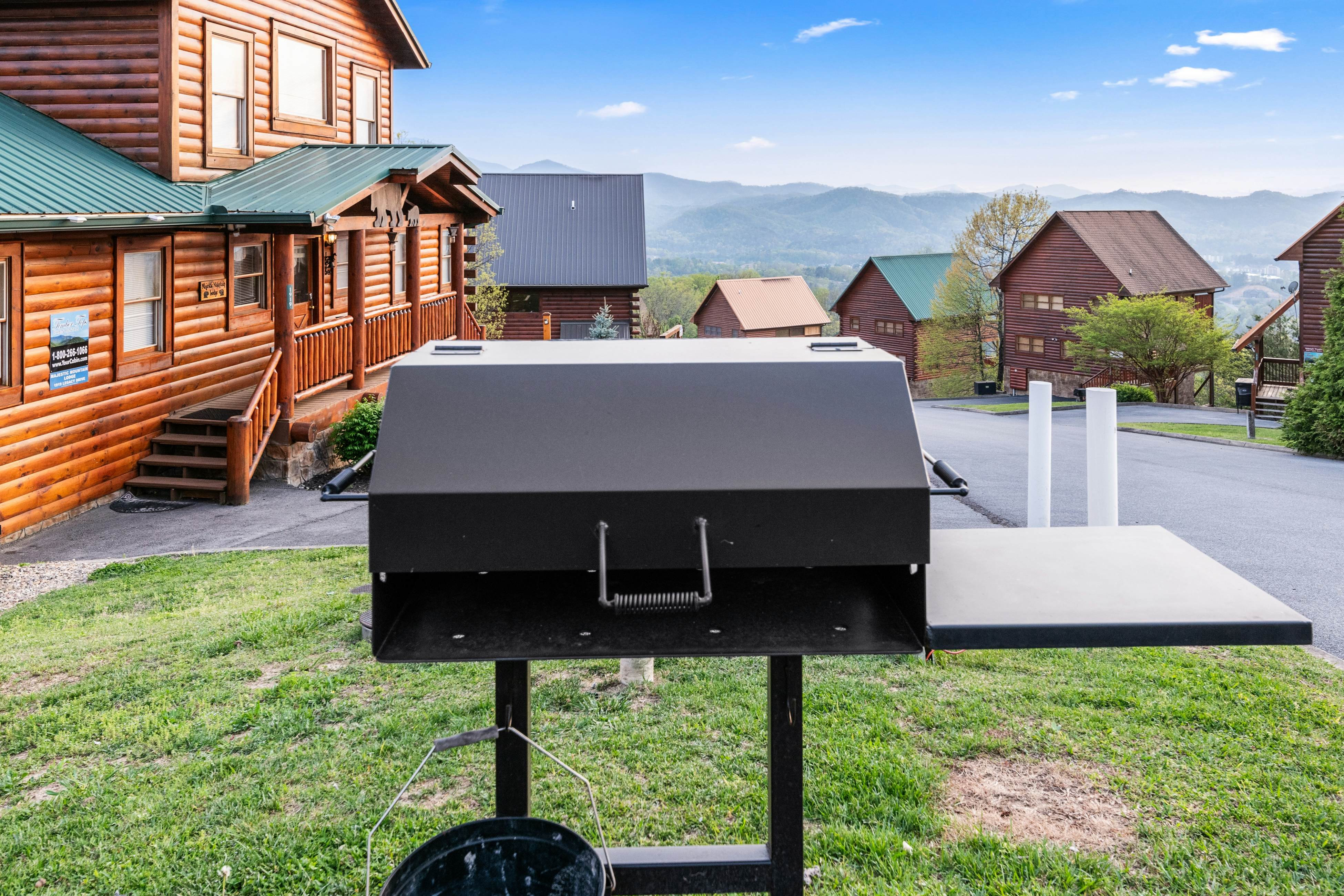 Rustic log cabin w/ Free Attraction Tickets, mountain views, hot tub, & games