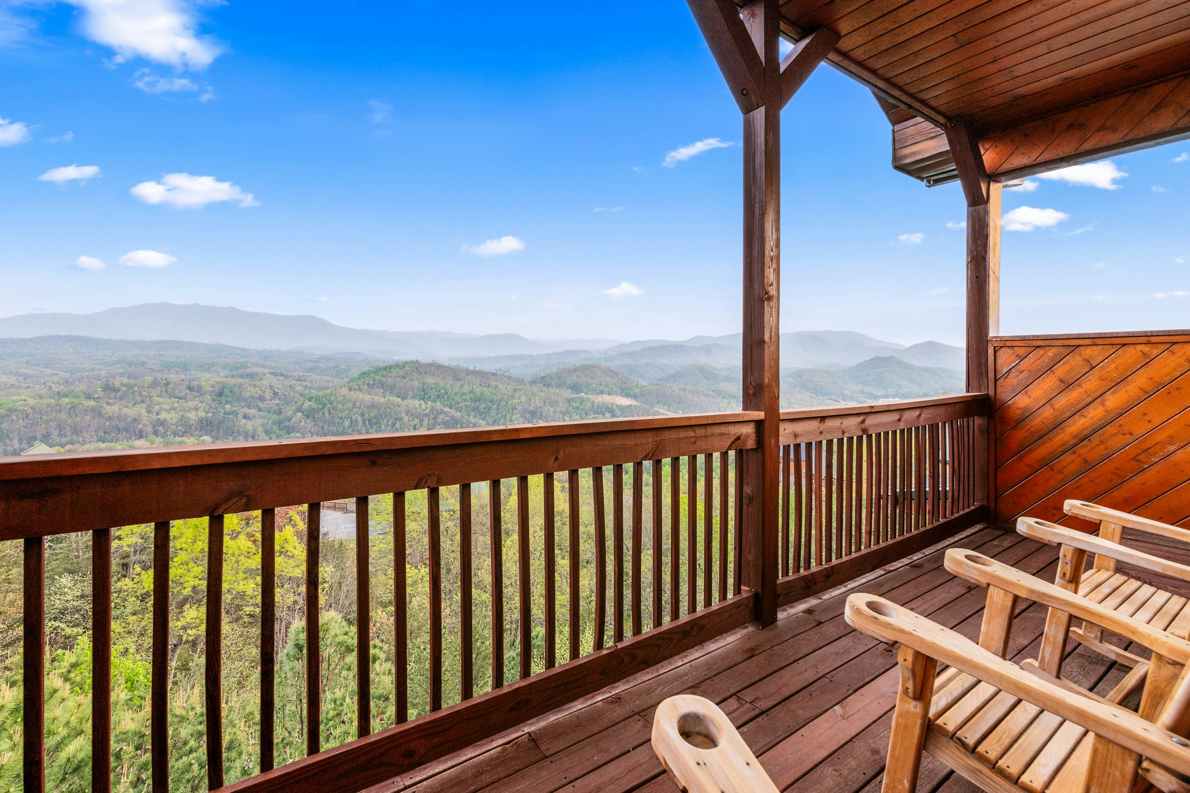 Rustic log cabin w/ Free Attraction Tickets, mountain views, hot tub, & games