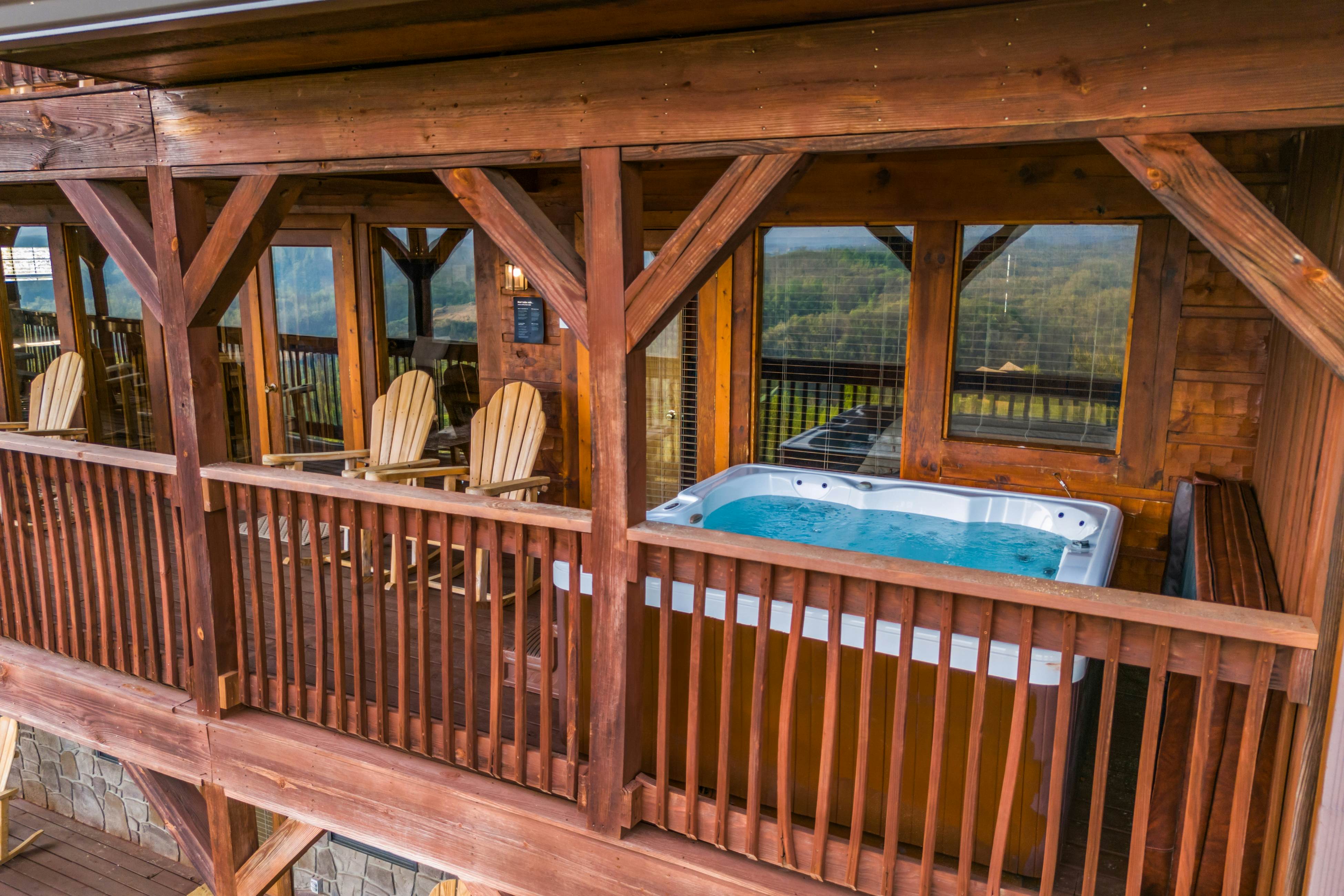 Rustic log cabin w/ Free Attraction Tickets, mountain views, hot tub, & games
