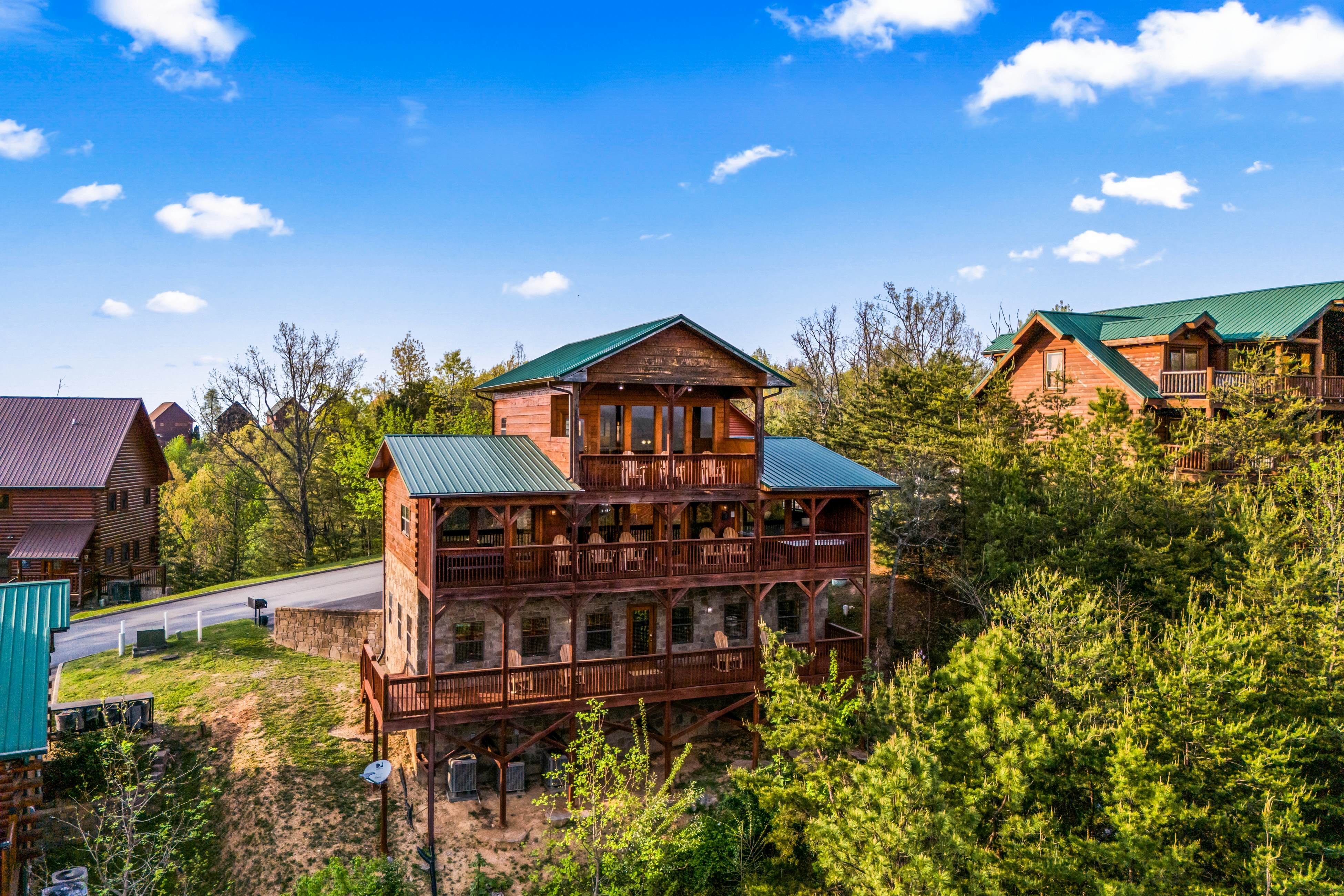 Rustic log cabin w/ Free Attraction Tickets, mountain views, hot tub, & games