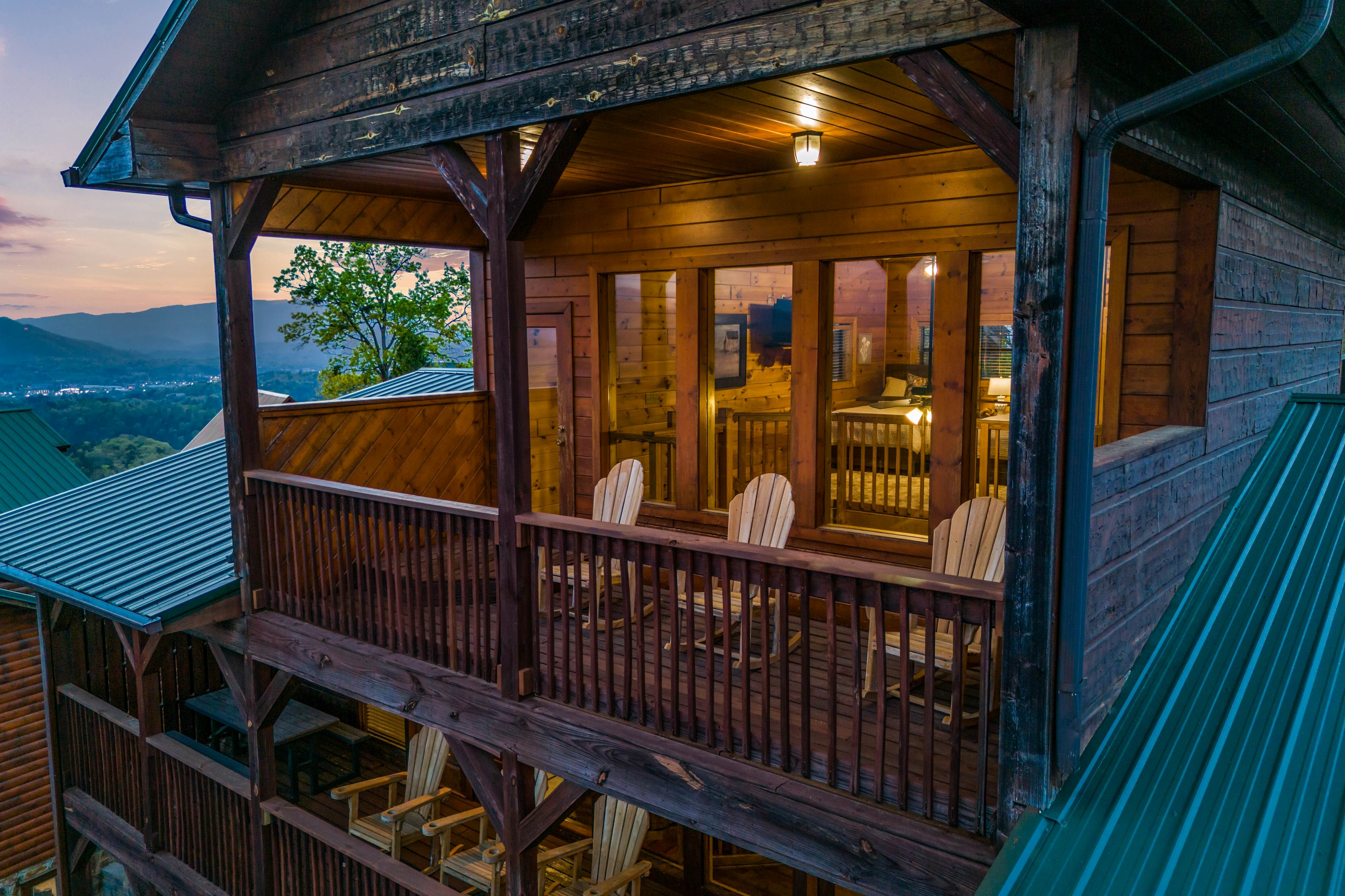 Rustic log cabin w/ Free Attraction Tickets, mountain views, hot tub, & games
