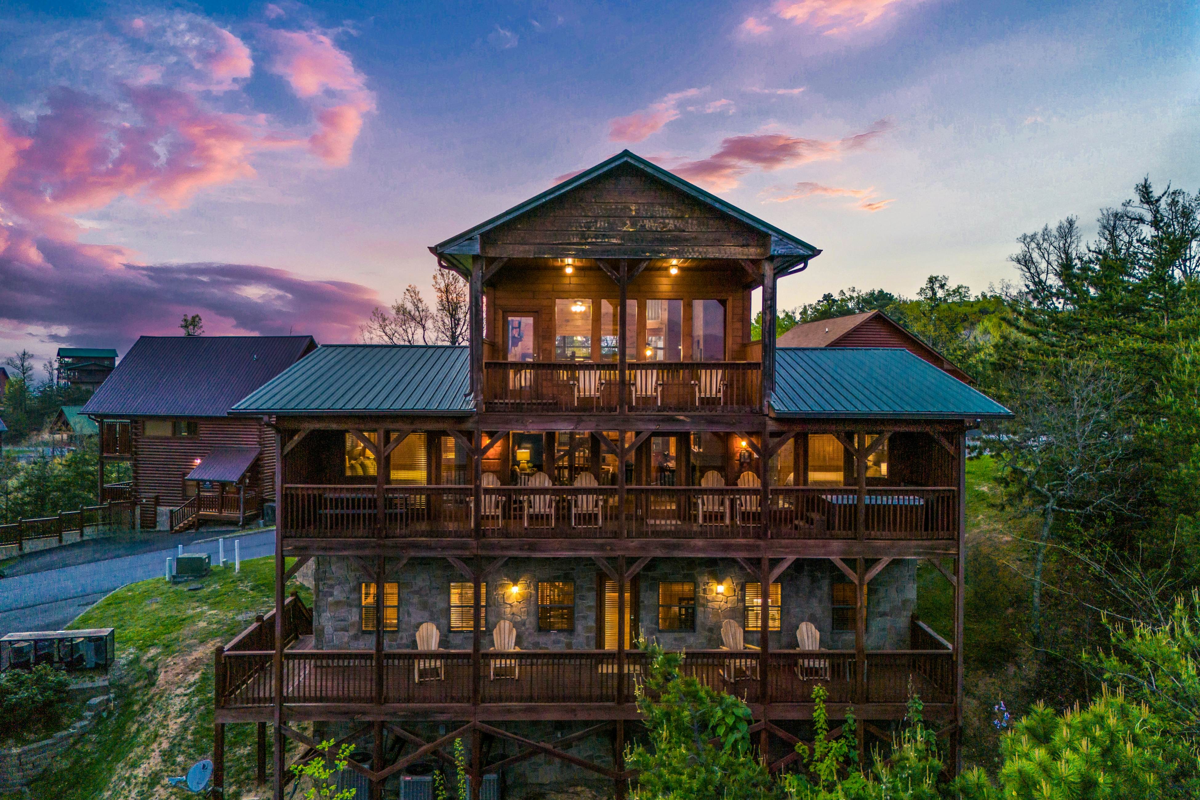 Rustic log cabin w/ Free Attraction Tickets, mountain views, hot tub, & games