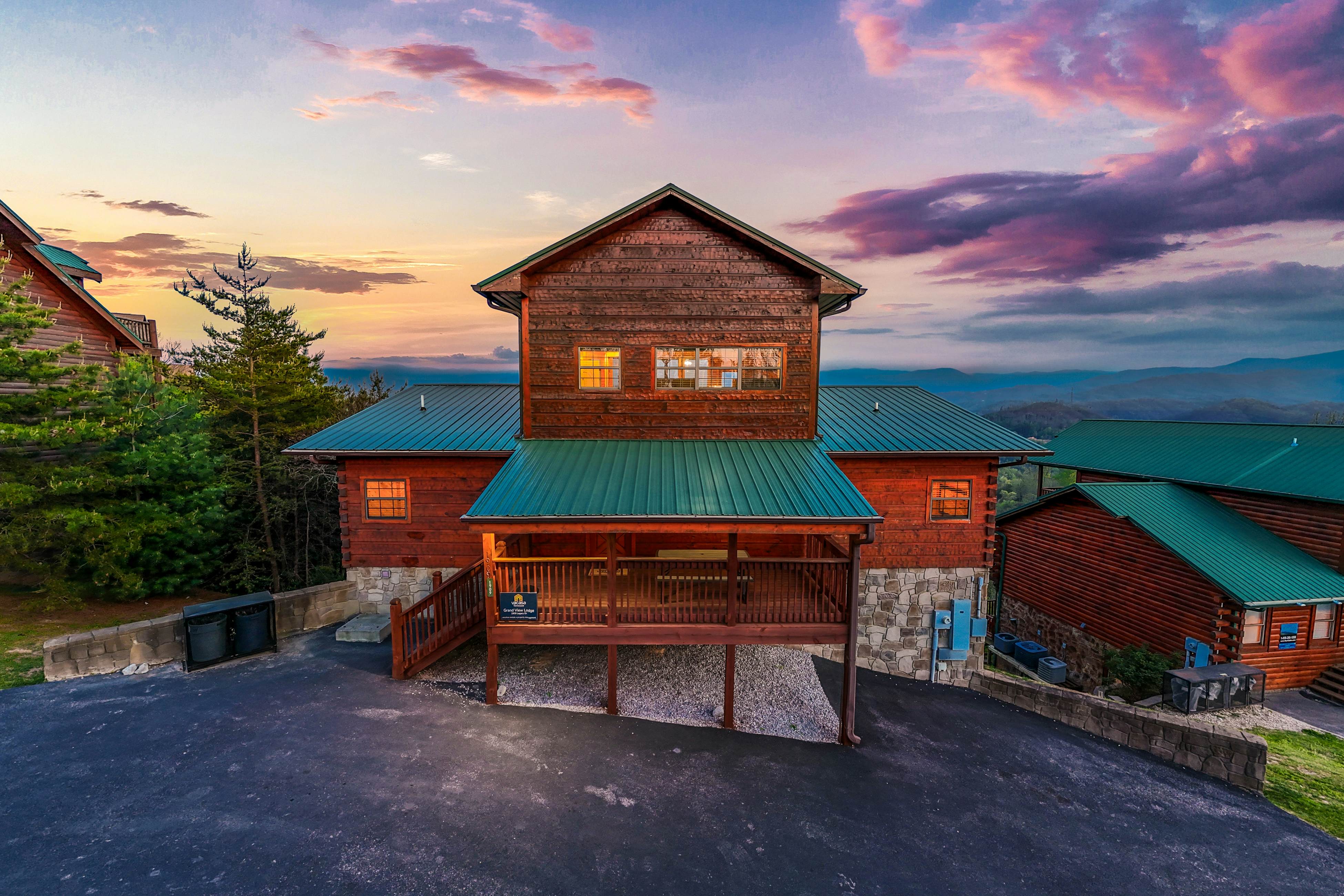 Rustic log cabin w/ Free Attraction Tickets, mountain views, hot tub, & games