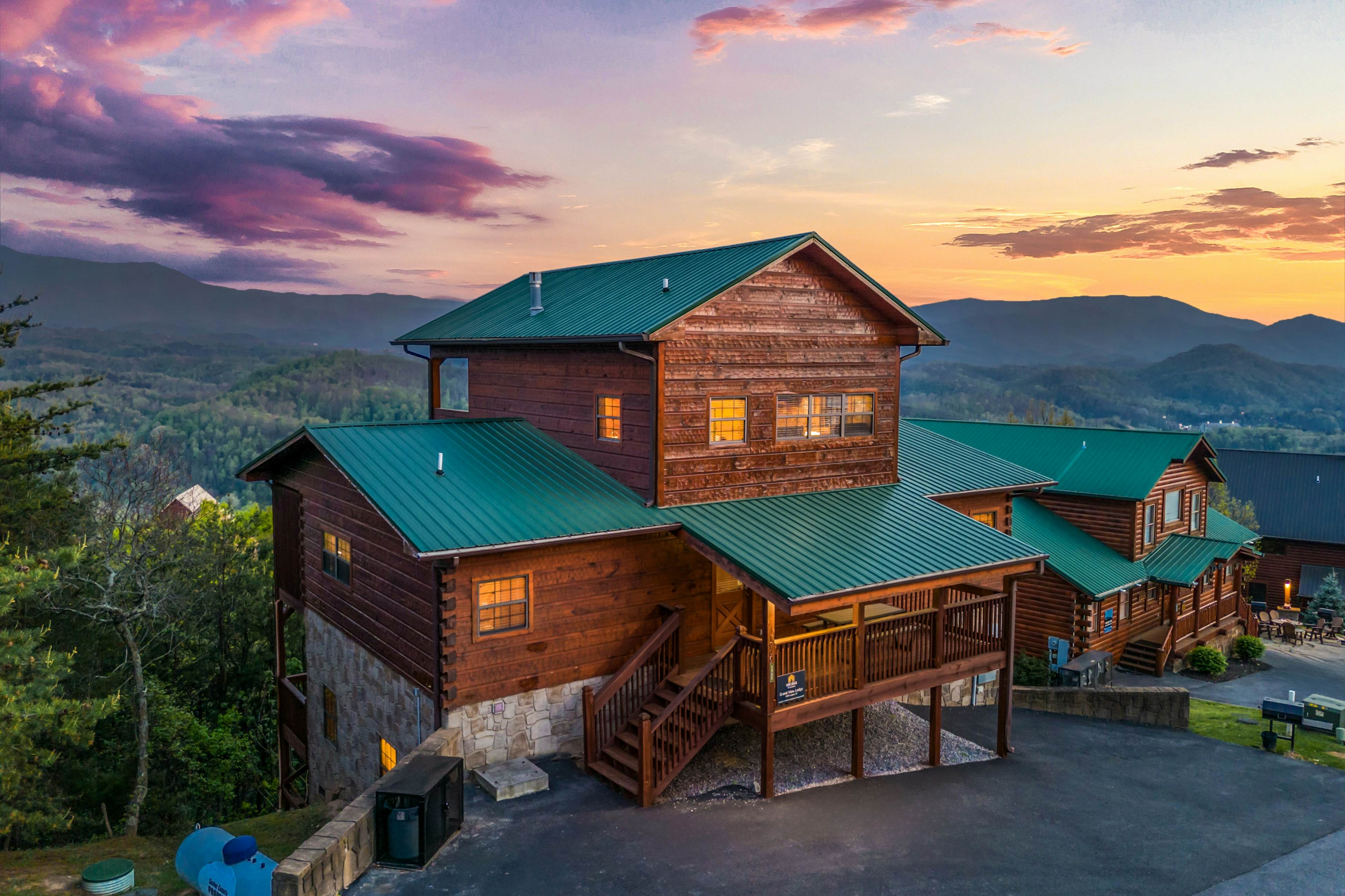 Rustic log cabin w/ Free Attraction Tickets, mountain views, hot tub, & games