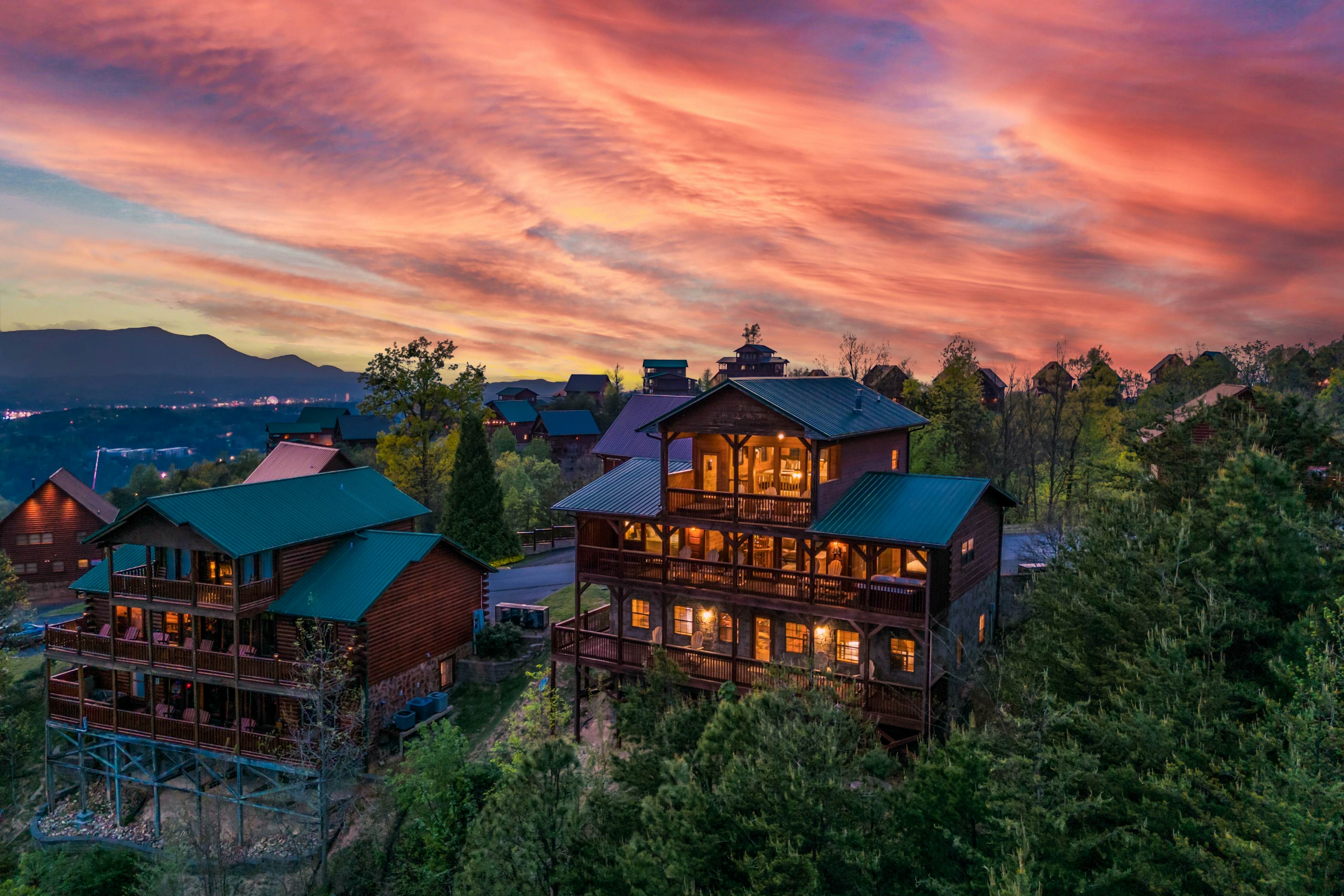 Rustic log cabin w/ Free Attraction Tickets, mountain views, hot tub, & games