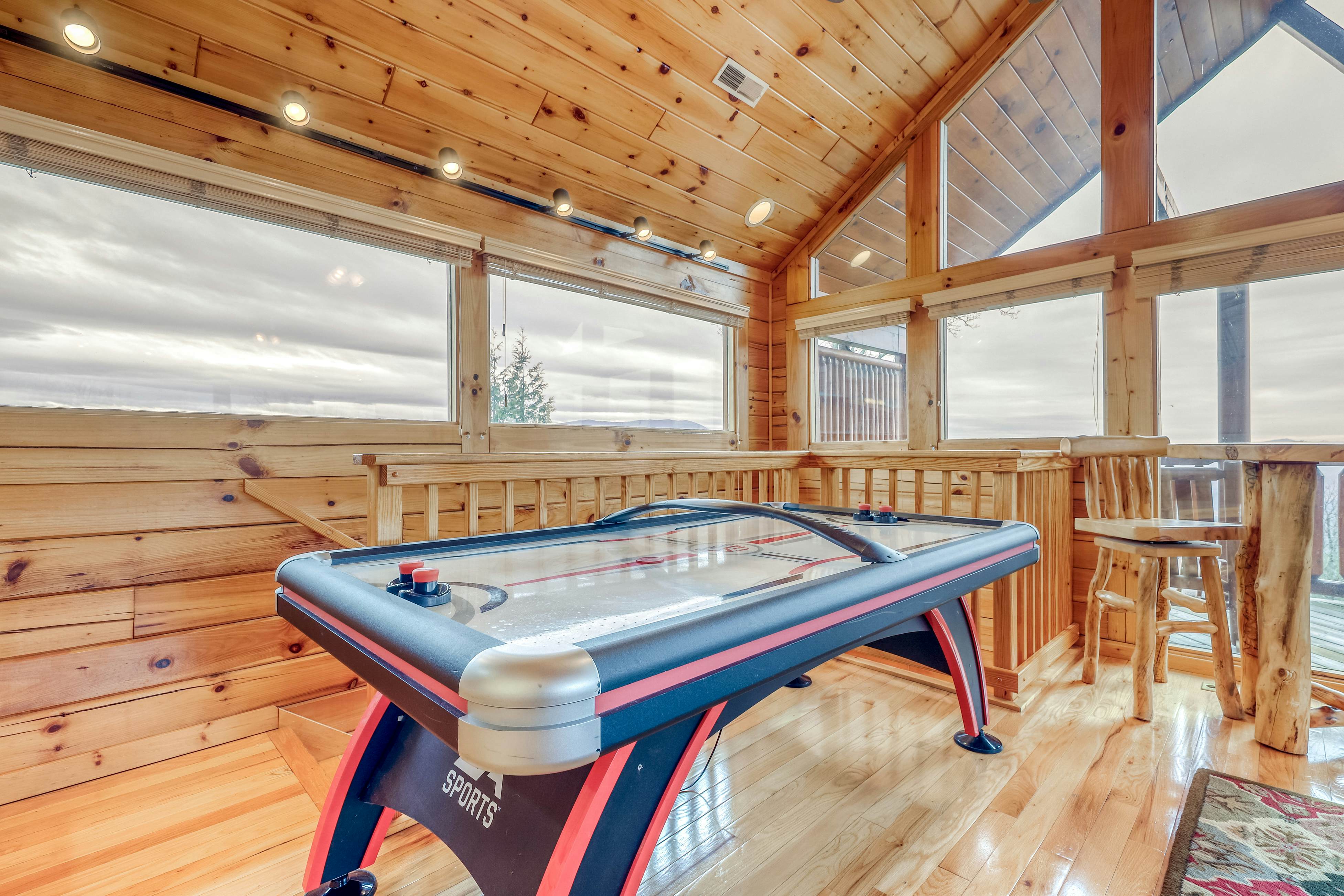 Two-story cabin w/ Free Attraction Tickets, hot tub, community pool, & views