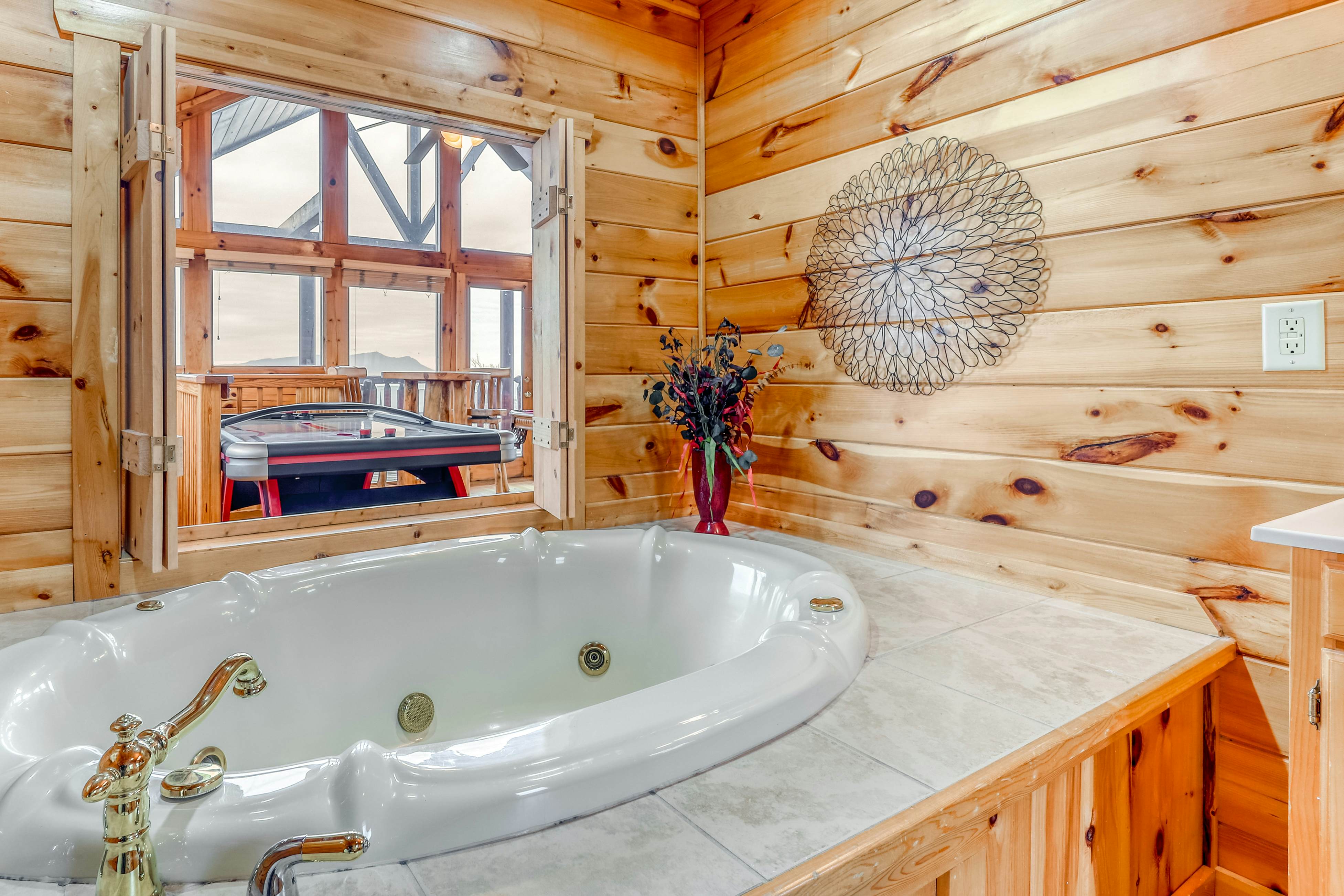 Two-story cabin w/ Free Attraction Tickets, hot tub, community pool, & views