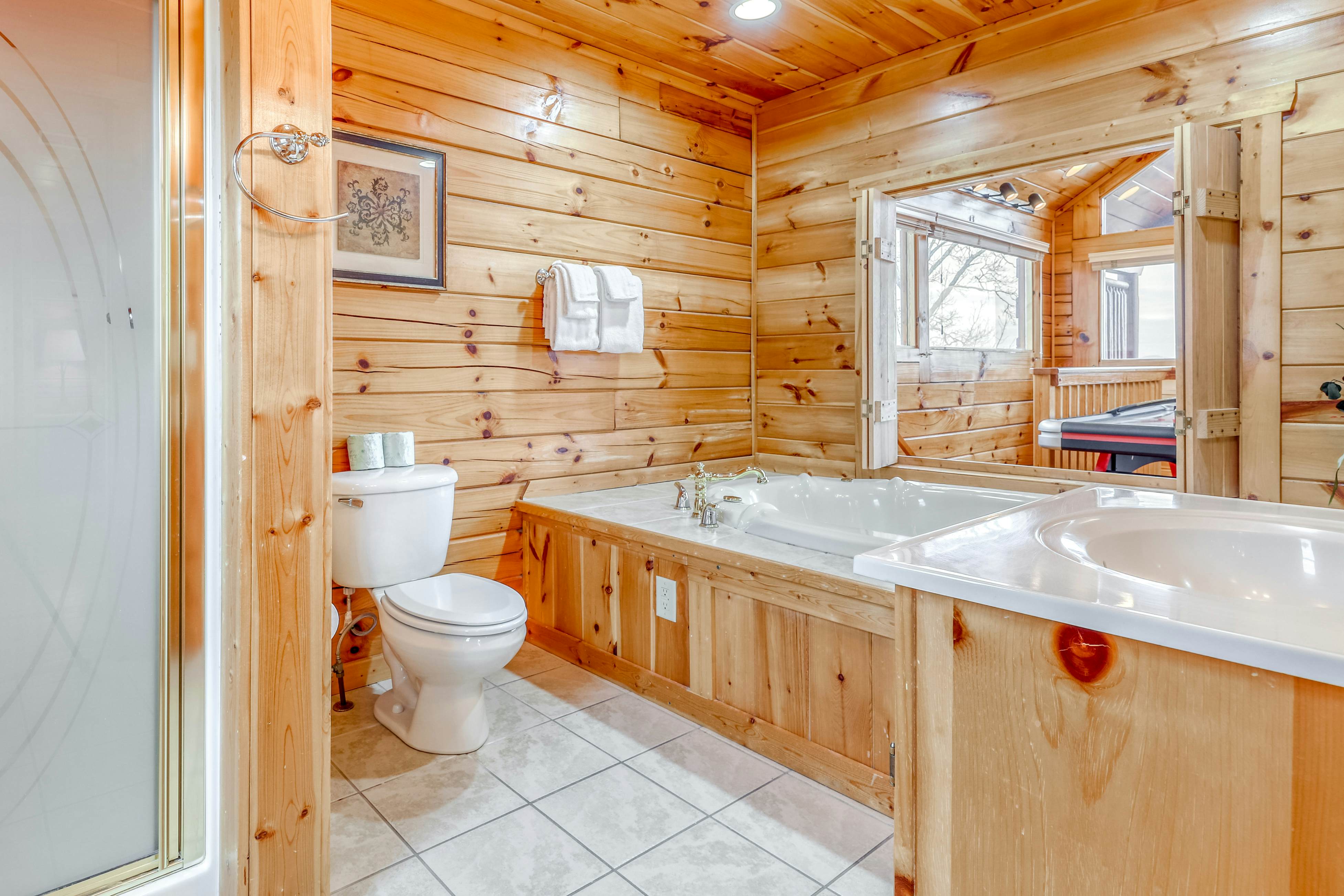 Two-story cabin w/ Free Attraction Tickets, hot tub, community pool, & views