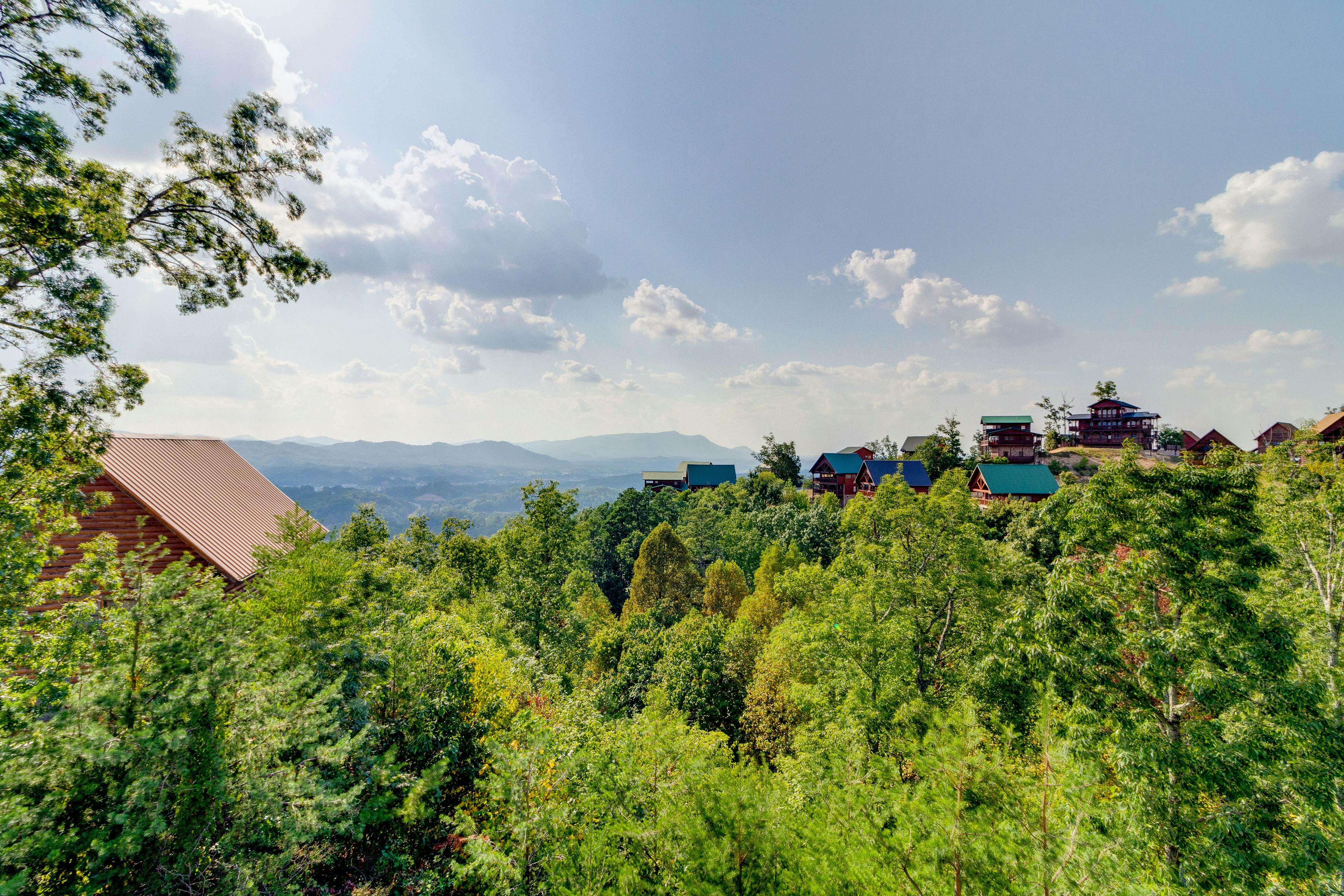 Two-story cabin w/ Free Attraction Tickets, hot tub, community pool, & views