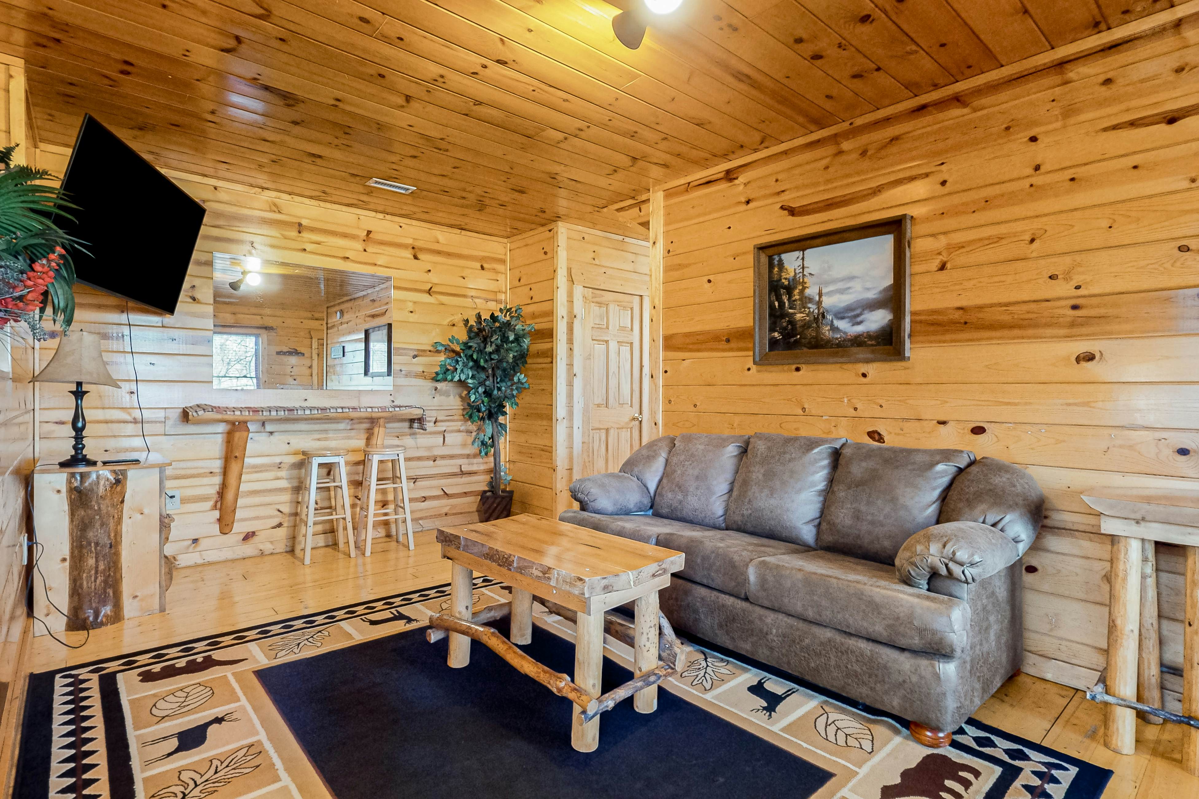 Smoky Mtn cabin w/ hot tub, pool table, foosball, & free attraction tickets