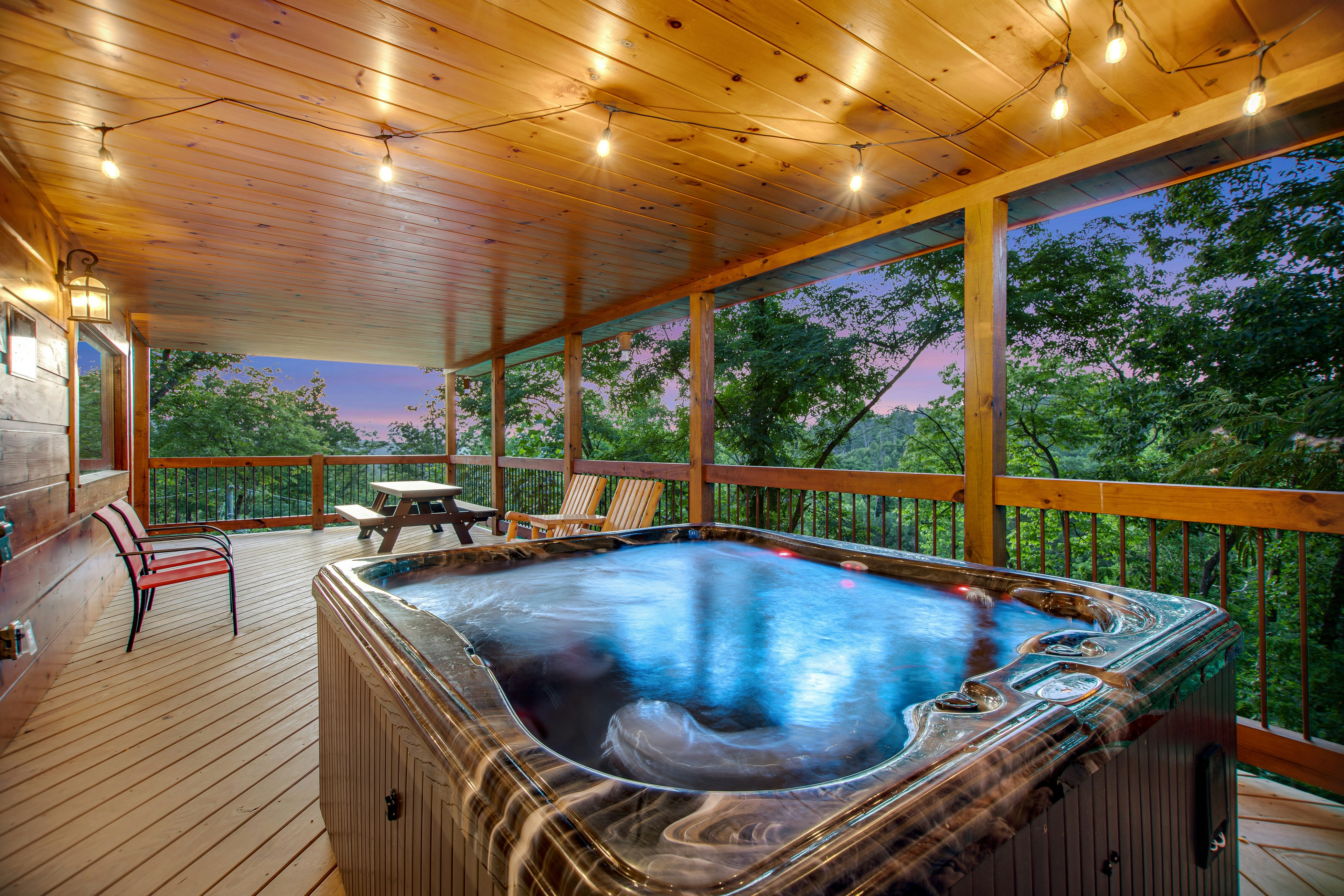 Homey Cabin with Private Hot Tub, Free Attraction Tickets, Pool Table, & AC