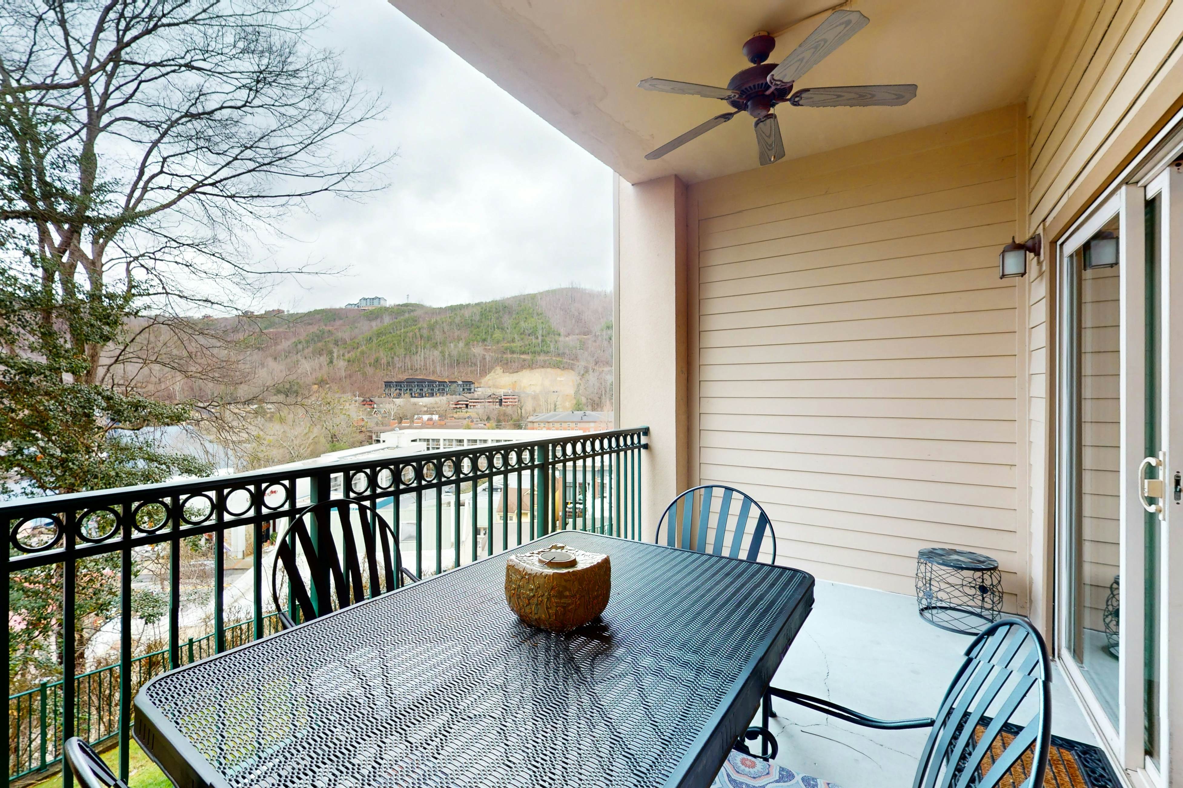 Mountain view condo w/ free attraction tickets, fireplace, & seasonal pool