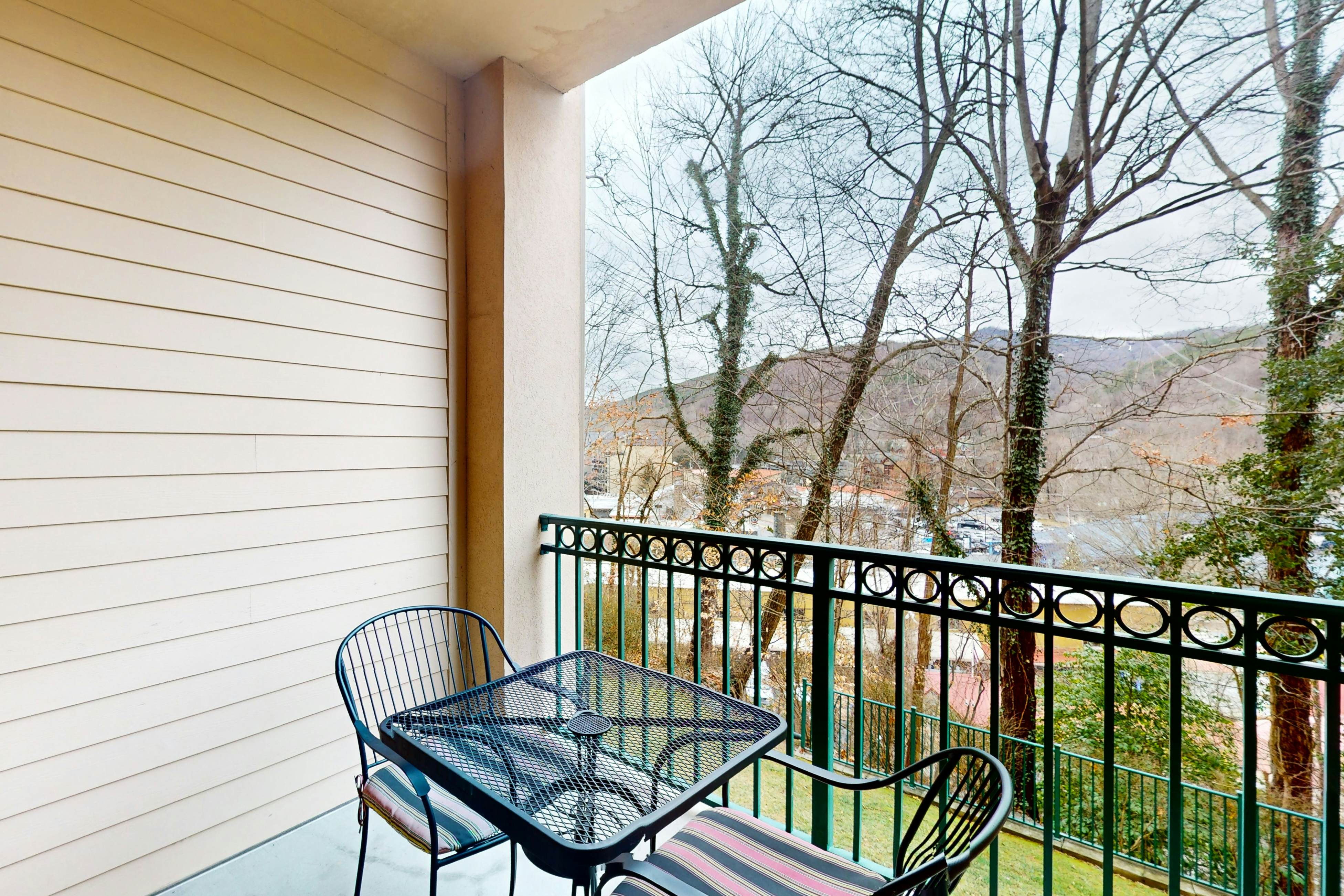 Mountain view condo w/ free attraction tickets, fireplace, & seasonal pool