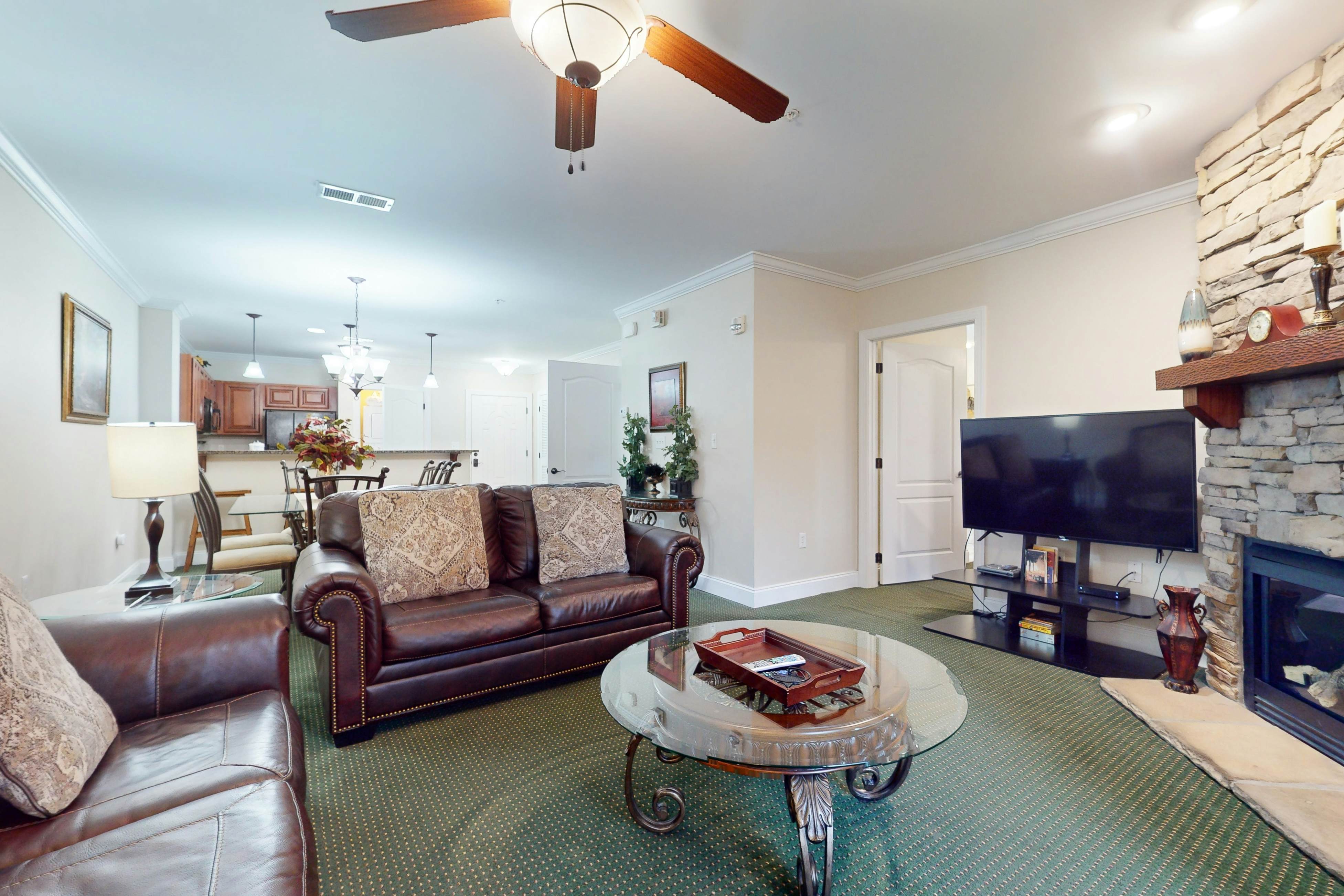 Mountain view condo w/ free attraction tickets, fireplace, & seasonal pool