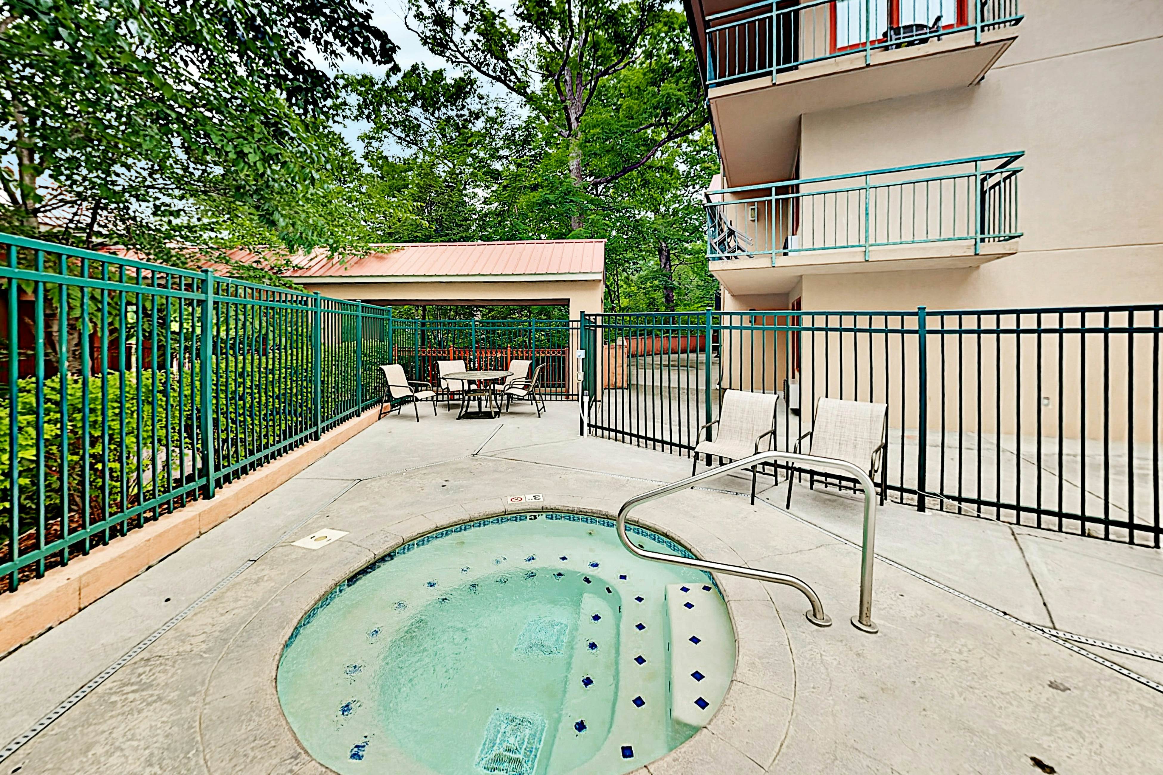 Mountain view condo w/ free attraction tickets, fireplace, & seasonal pool
