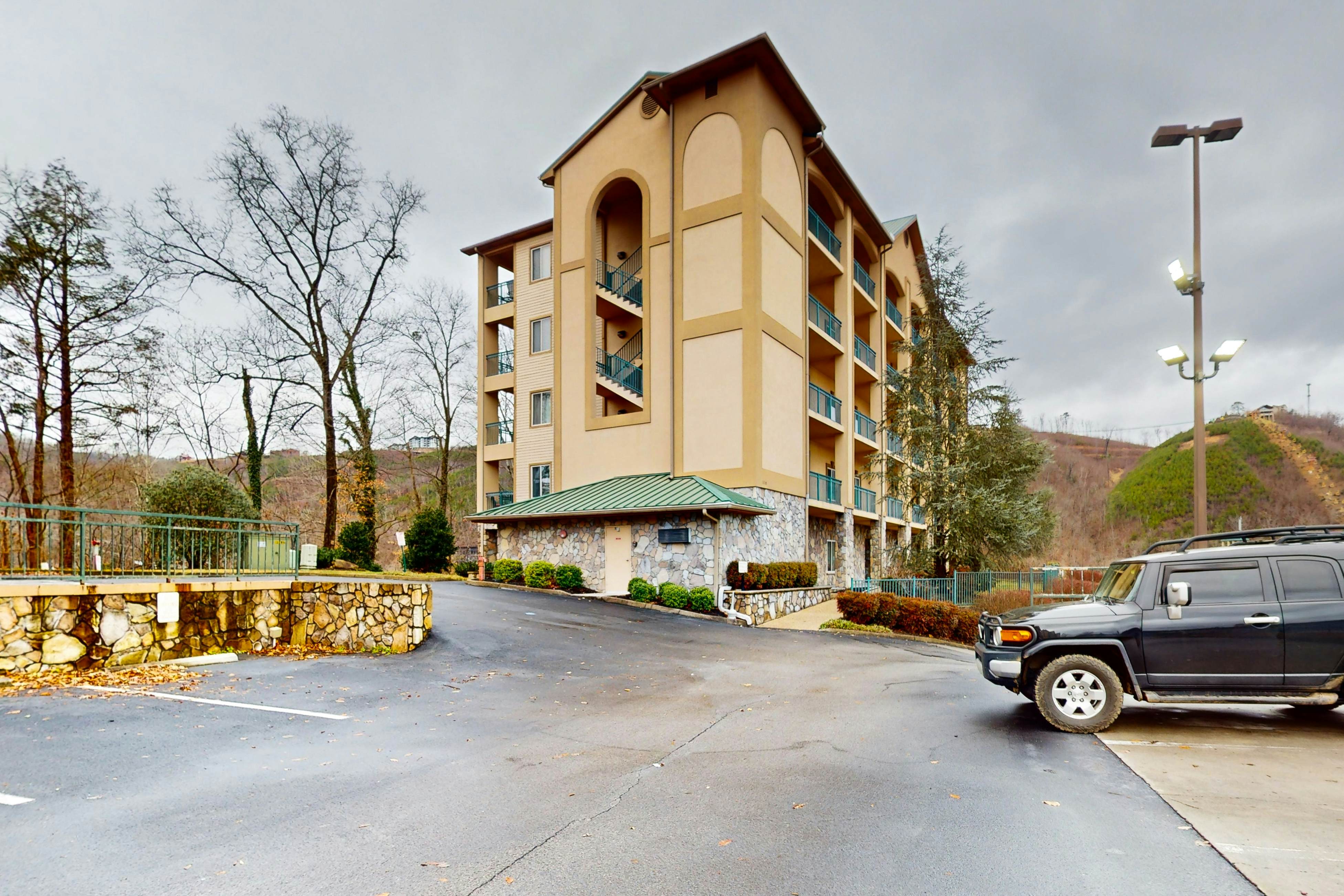 Mountain view condo w/ free attraction tickets, fireplace, & seasonal pool