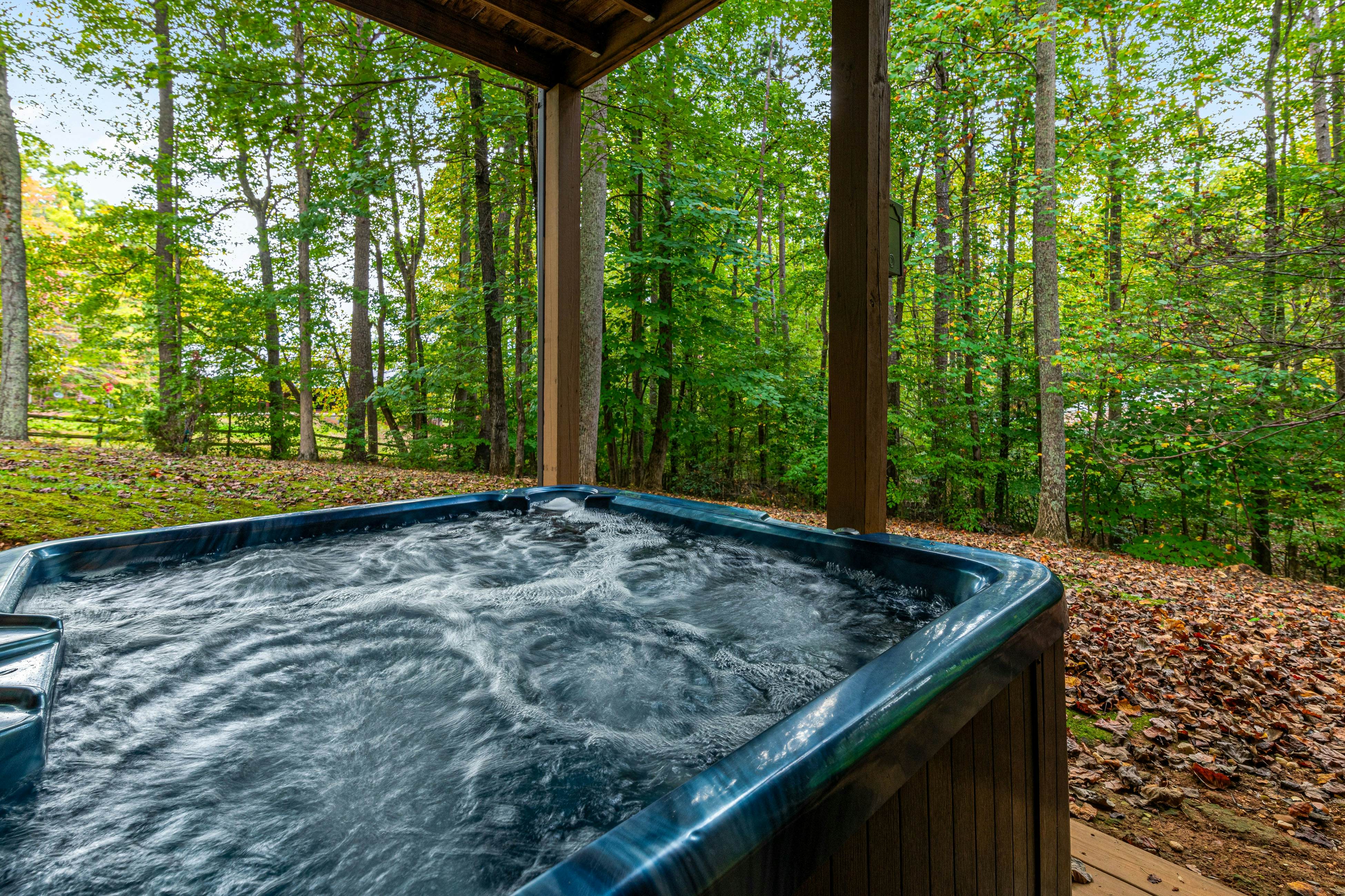 Smoky Mtn cabin w/ hot tub, firepit, game room, deck, & free attraction tickets