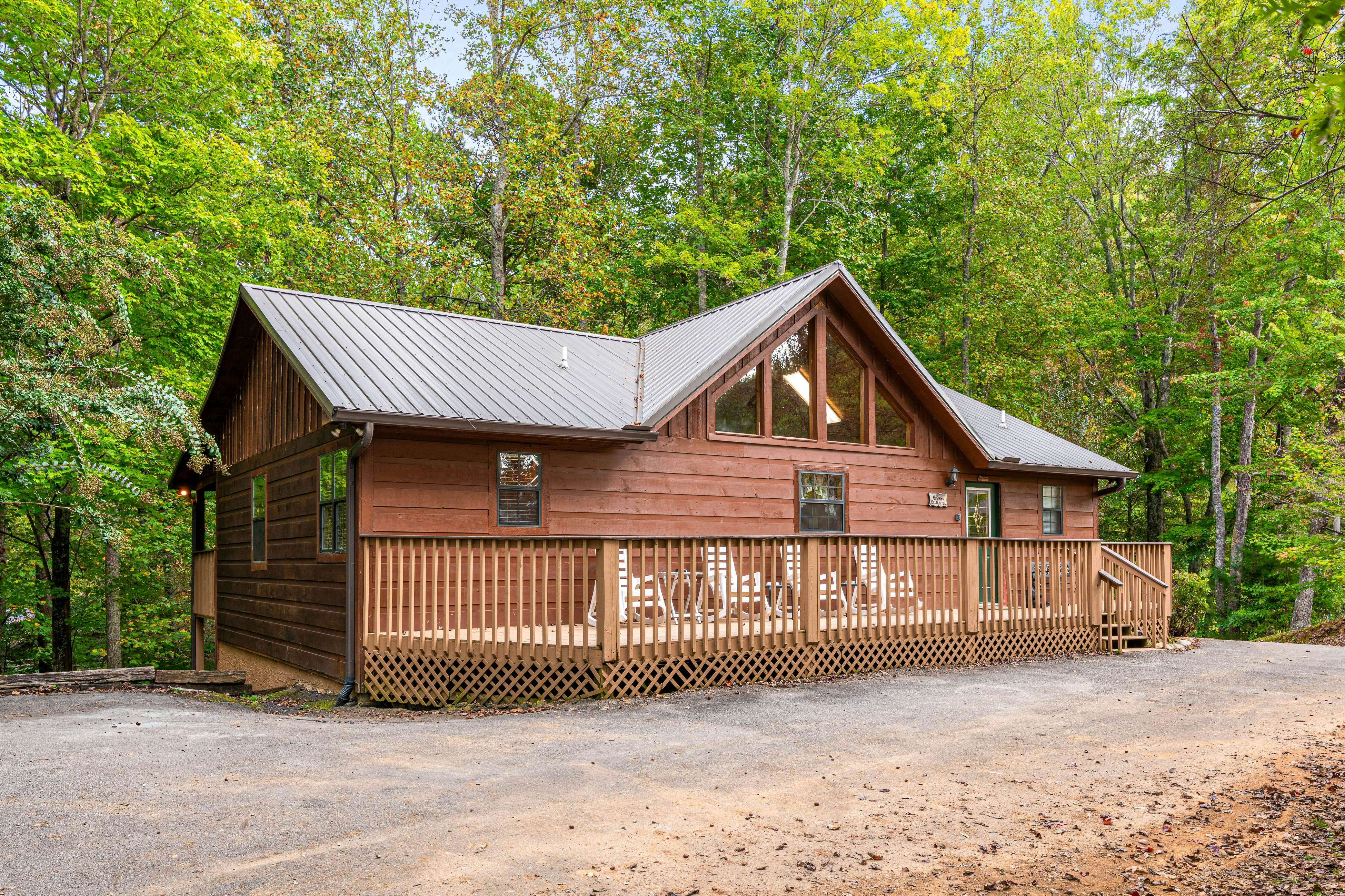 Smoky Mtn cabin w/ hot tub, firepit, game room, deck, & free attraction tickets
