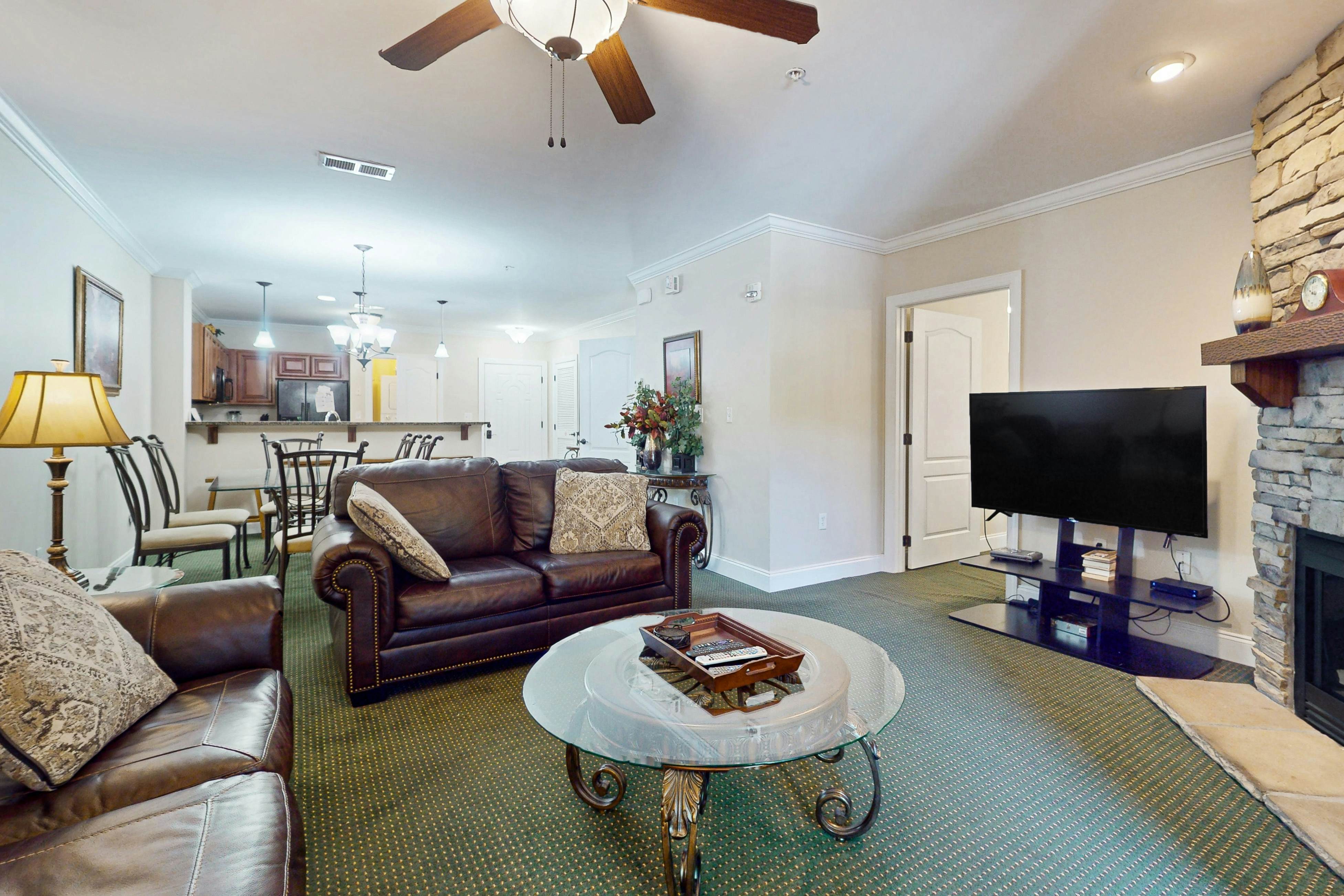 Central condo with private balcony, free attraction tickets, & pool/hot tub