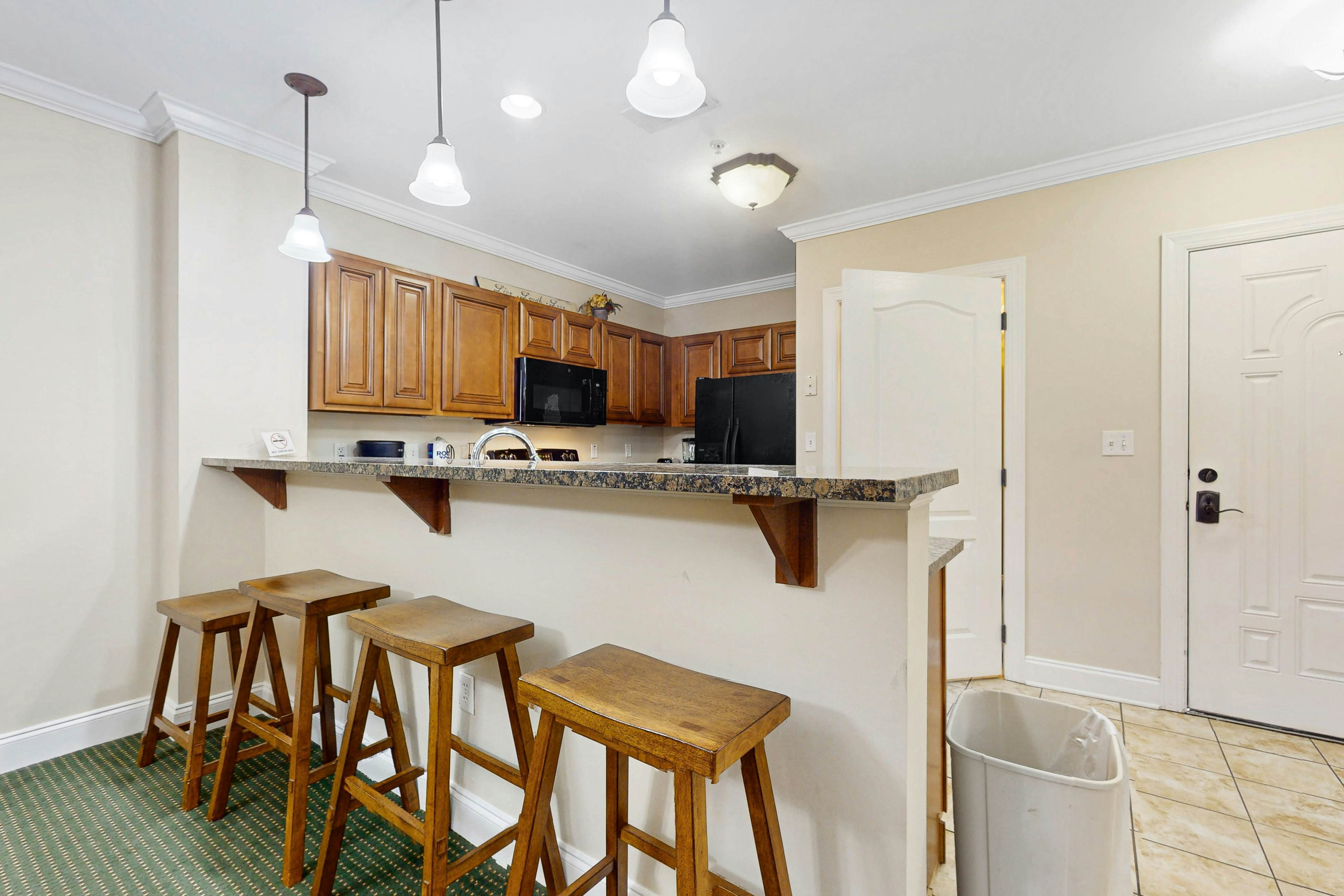 Central condo with private balcony, free attraction tickets, & pool/hot tub