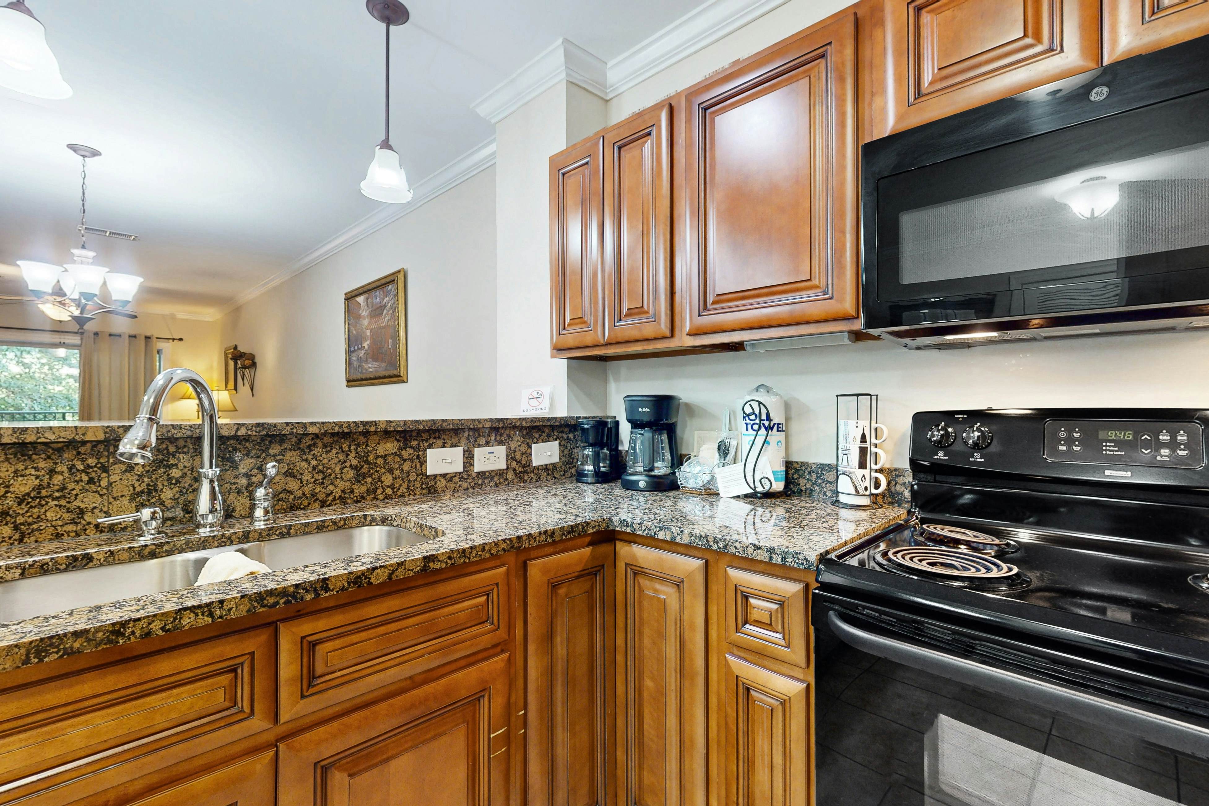 Central condo with private balcony, free attraction tickets, & pool/hot tub