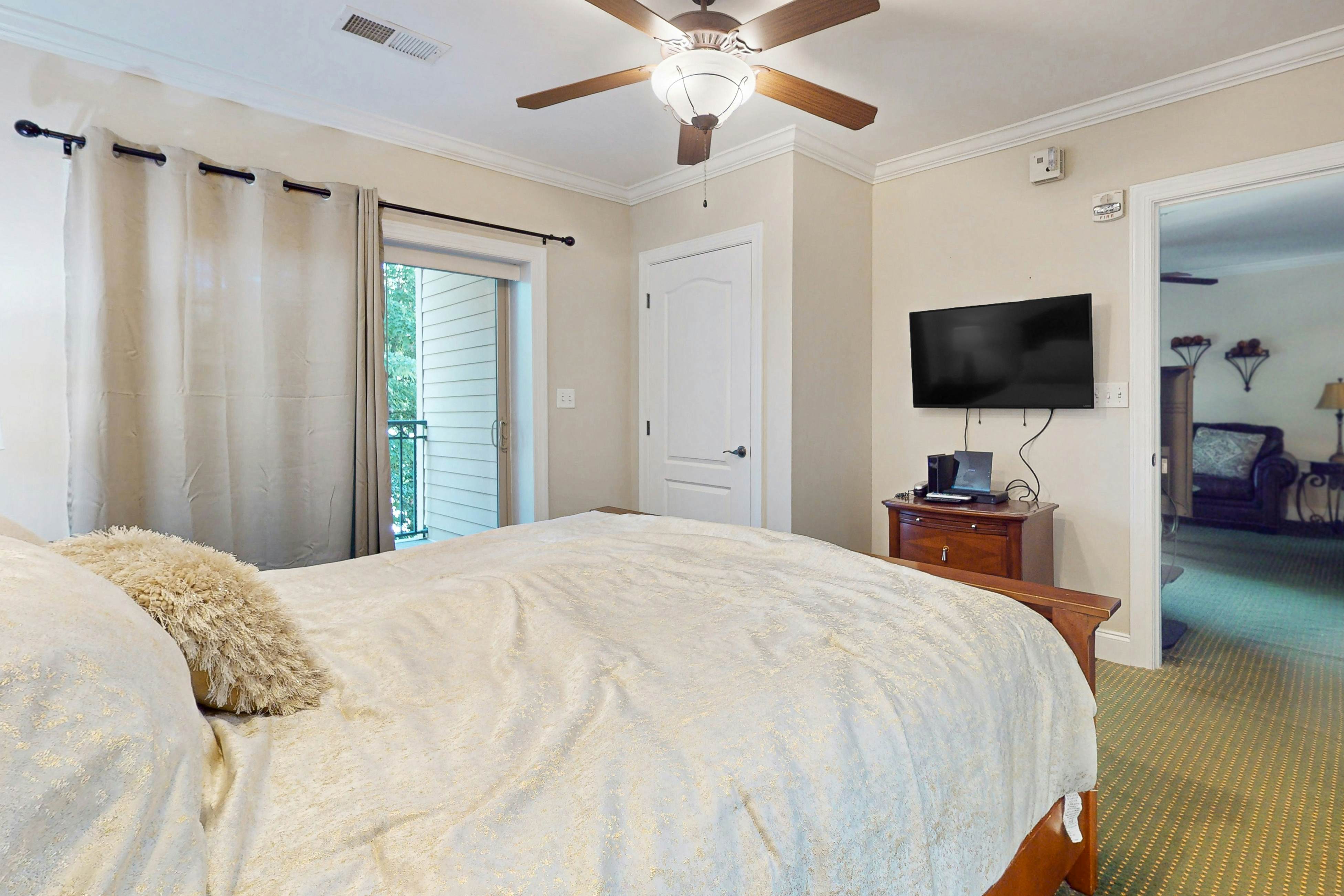 Central condo with private balcony, free attraction tickets, & pool/hot tub