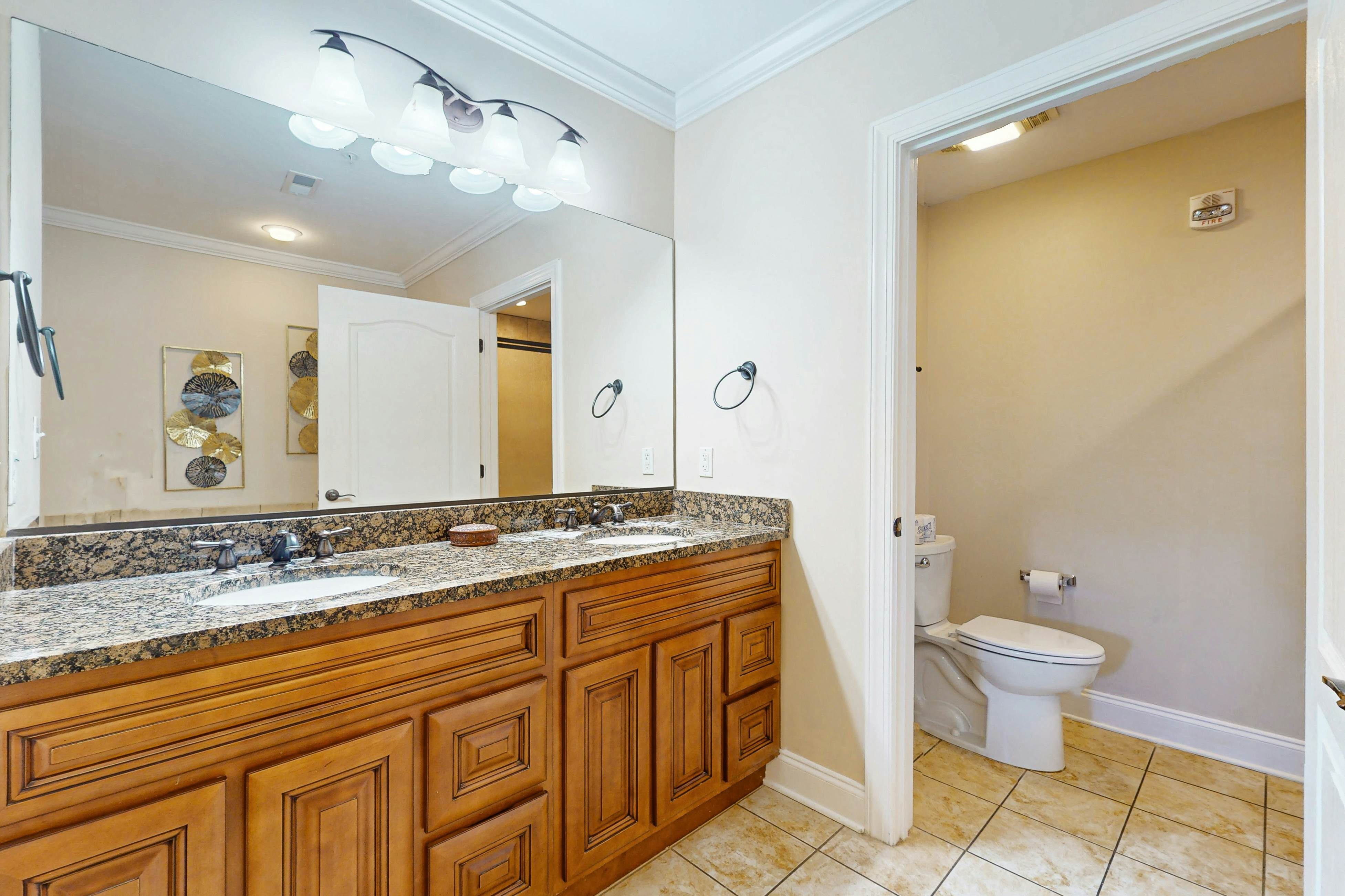 Central condo with private balcony, free attraction tickets, & pool/hot tub