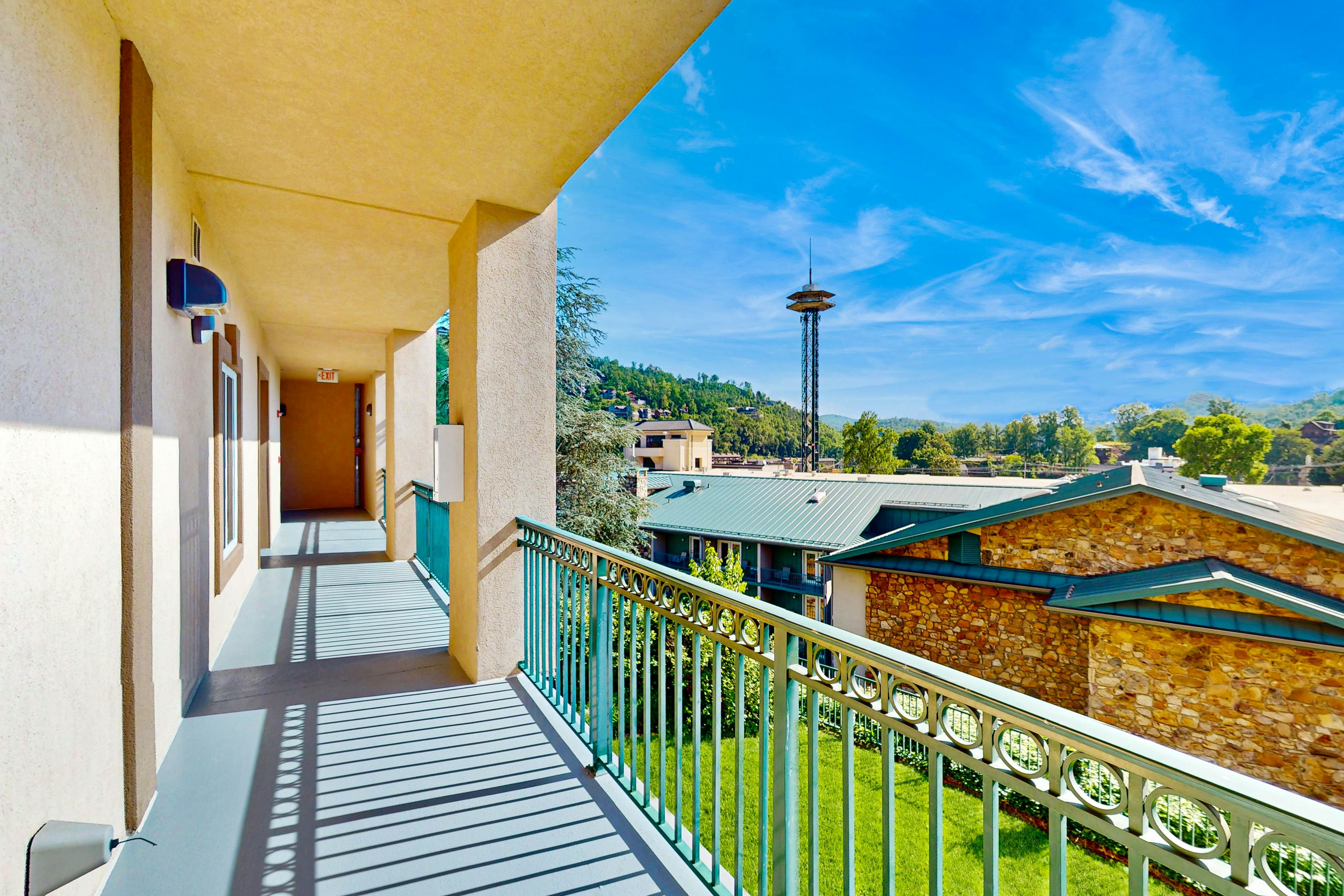 Central condo with private balcony, free attraction tickets, & pool/hot tub