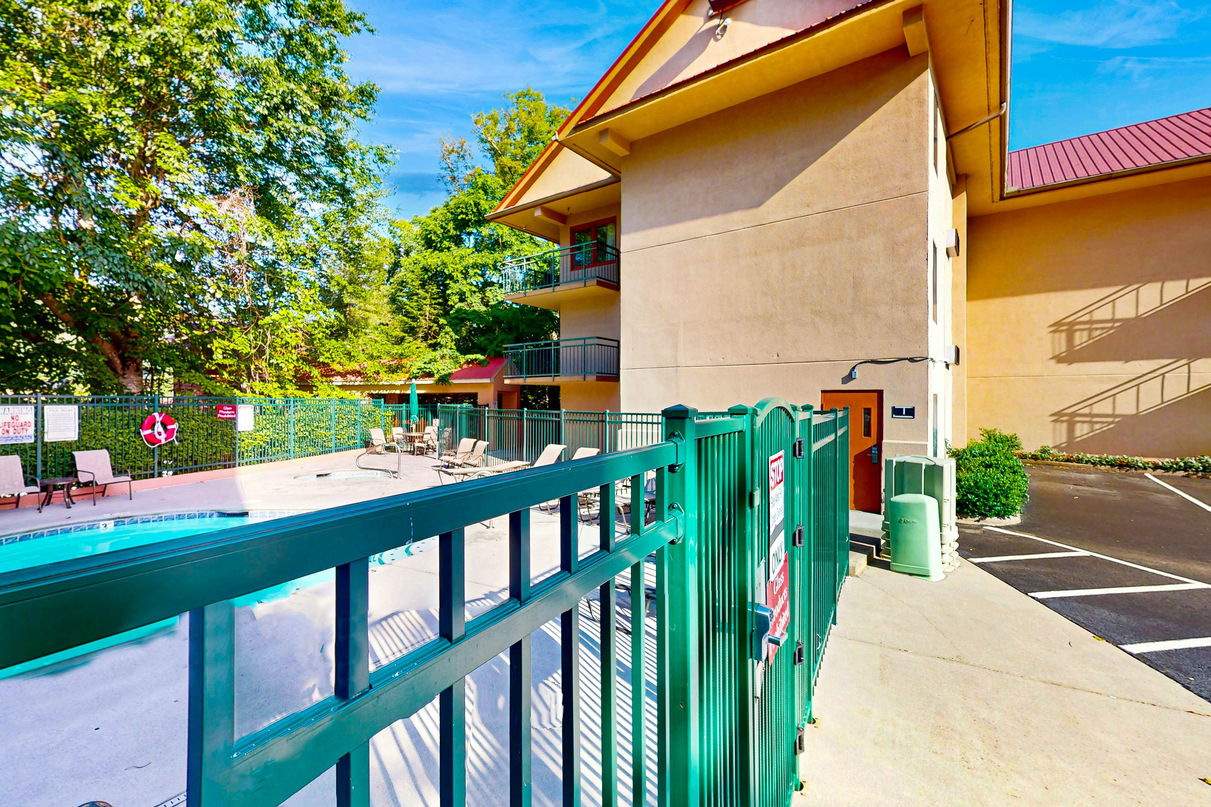 Central condo with private balcony, free attraction tickets, & pool/hot tub