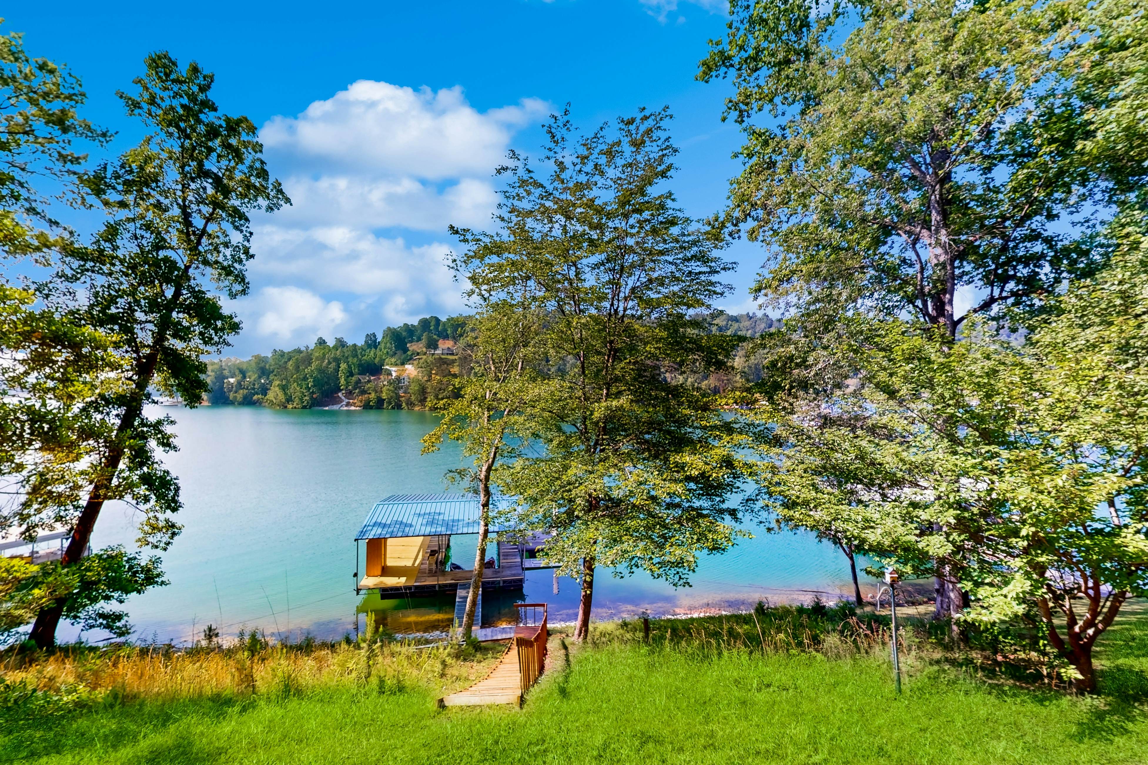 Lake front home with games, fire pit, gas grill and dock
