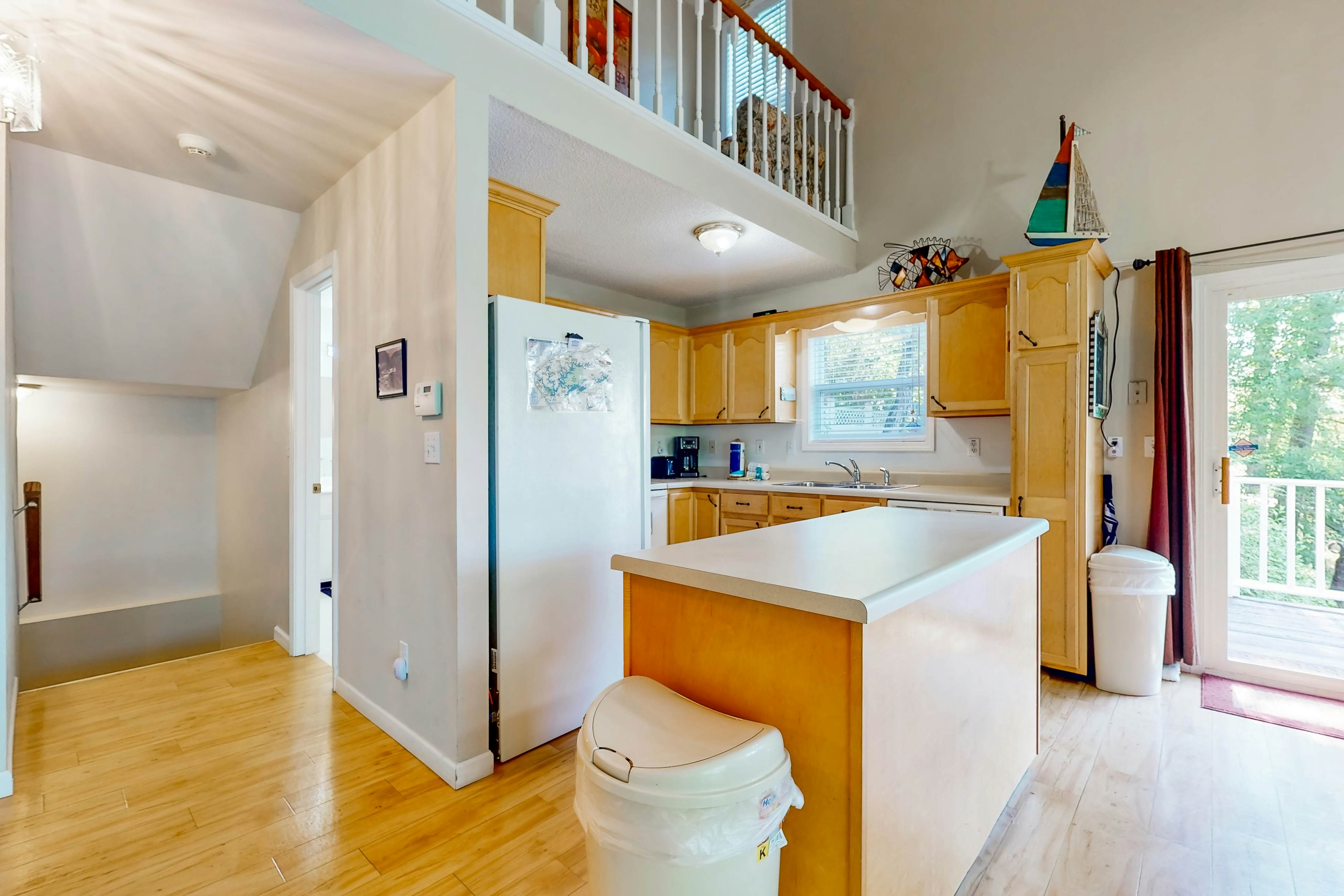 Lake front home with games, fire pit, gas grill and dock