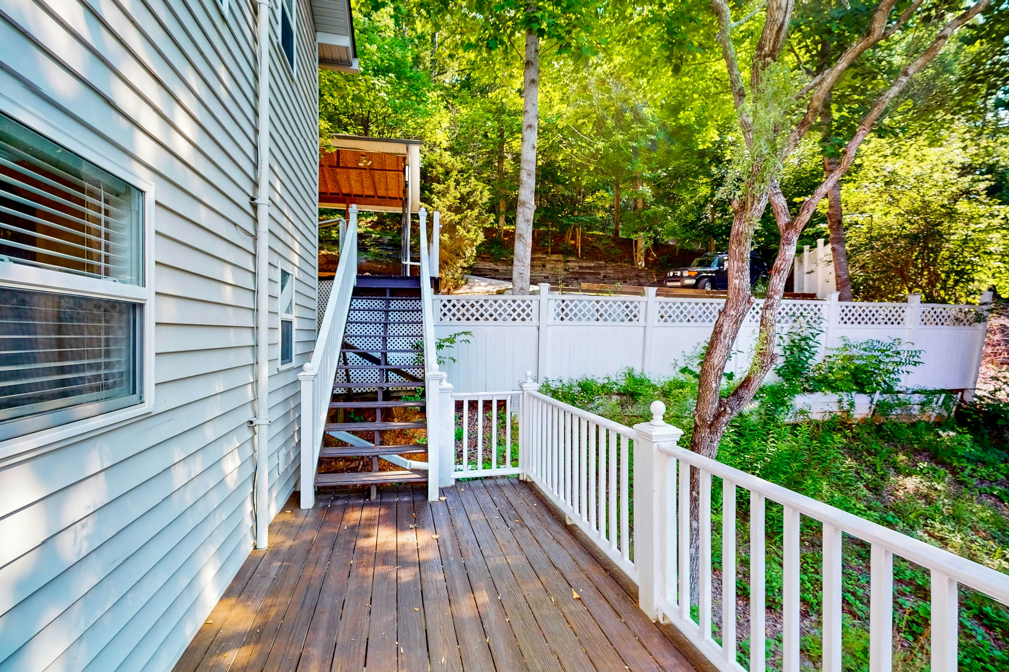 Lake front home with games, fire pit, gas grill and dock