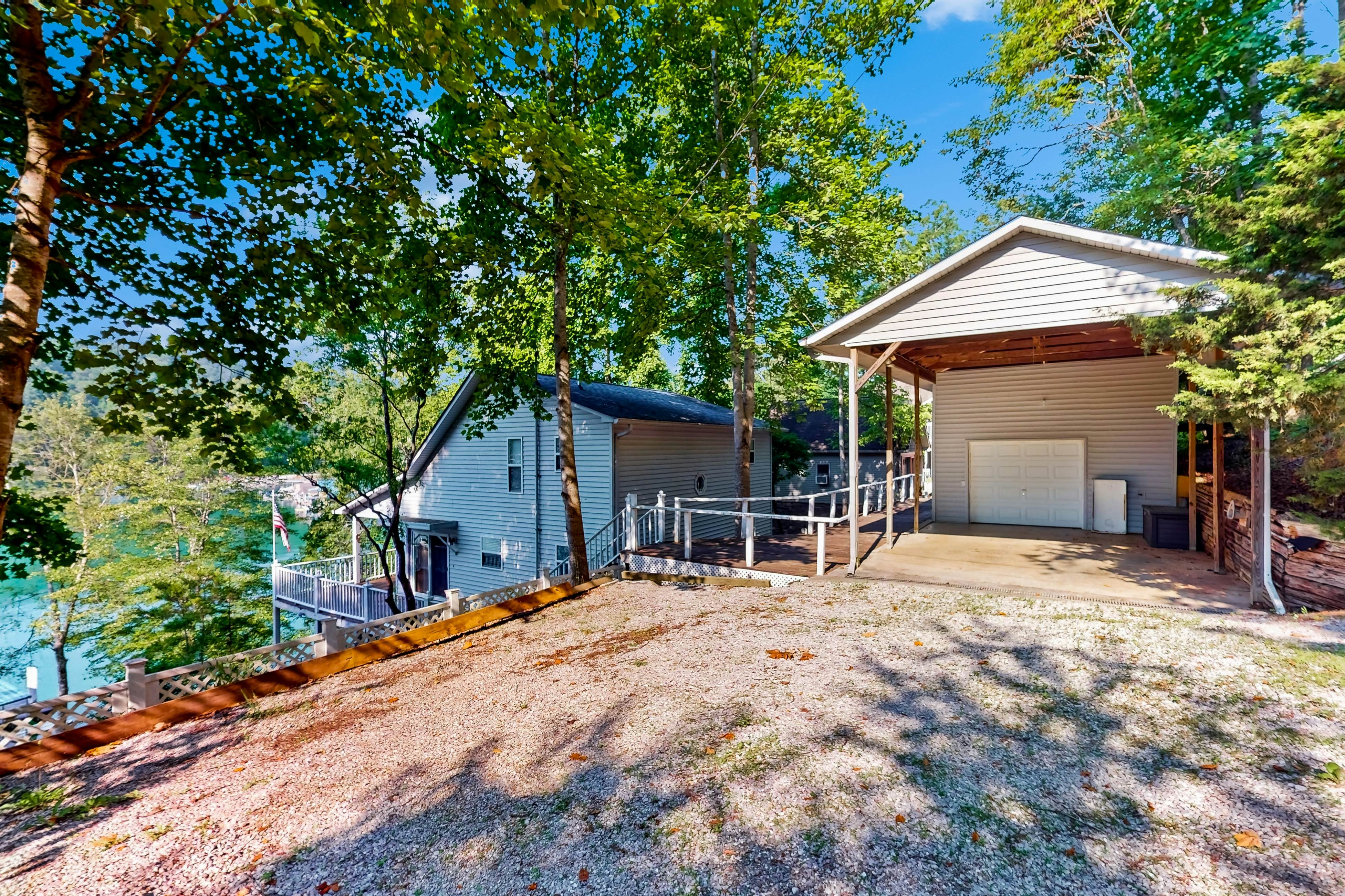 Lake front home with games, fire pit, gas grill and dock