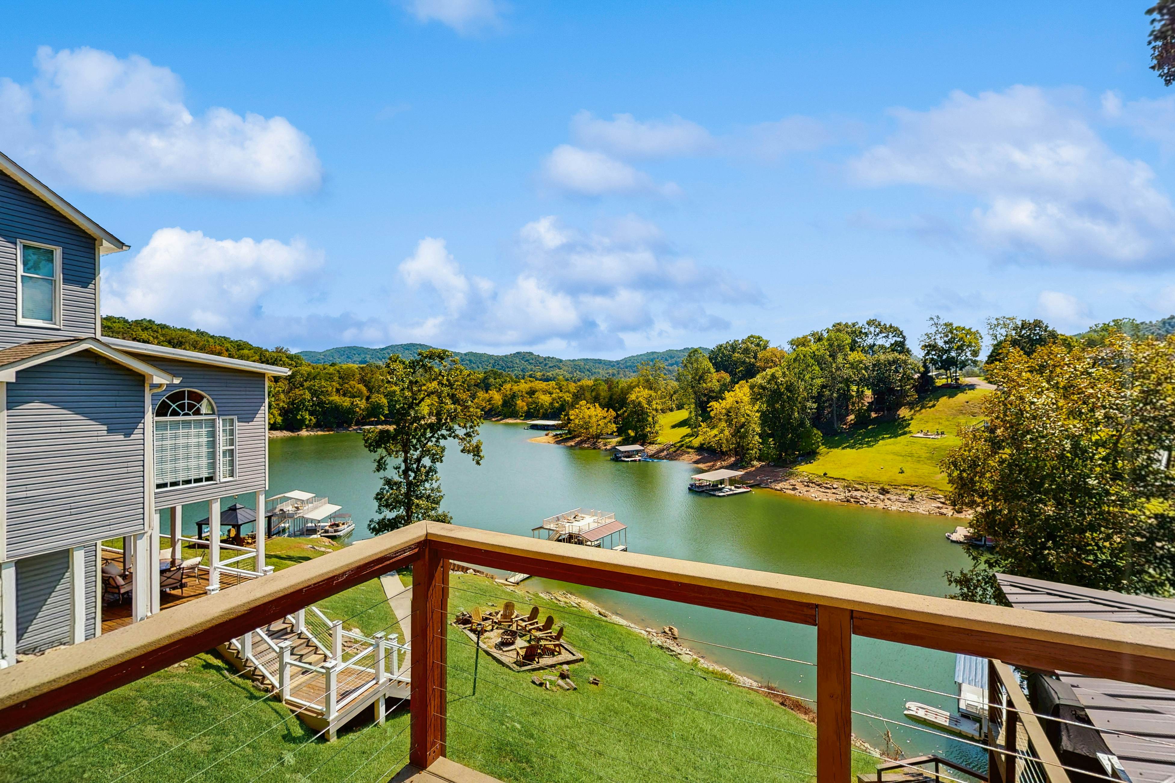 Stunning lake front home w/dock, card tables, wet bar, fire pit & amazing views!