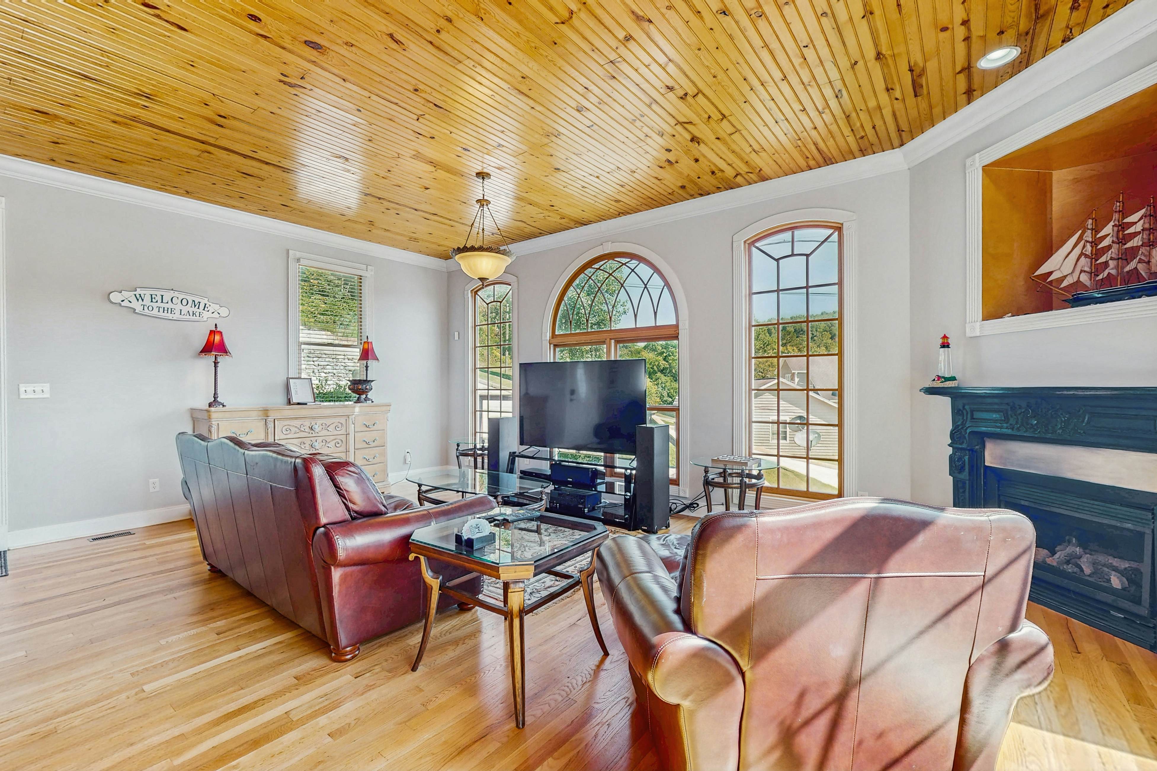 Stunning lake front home w/dock, card tables, wet bar, fire pit & amazing views!