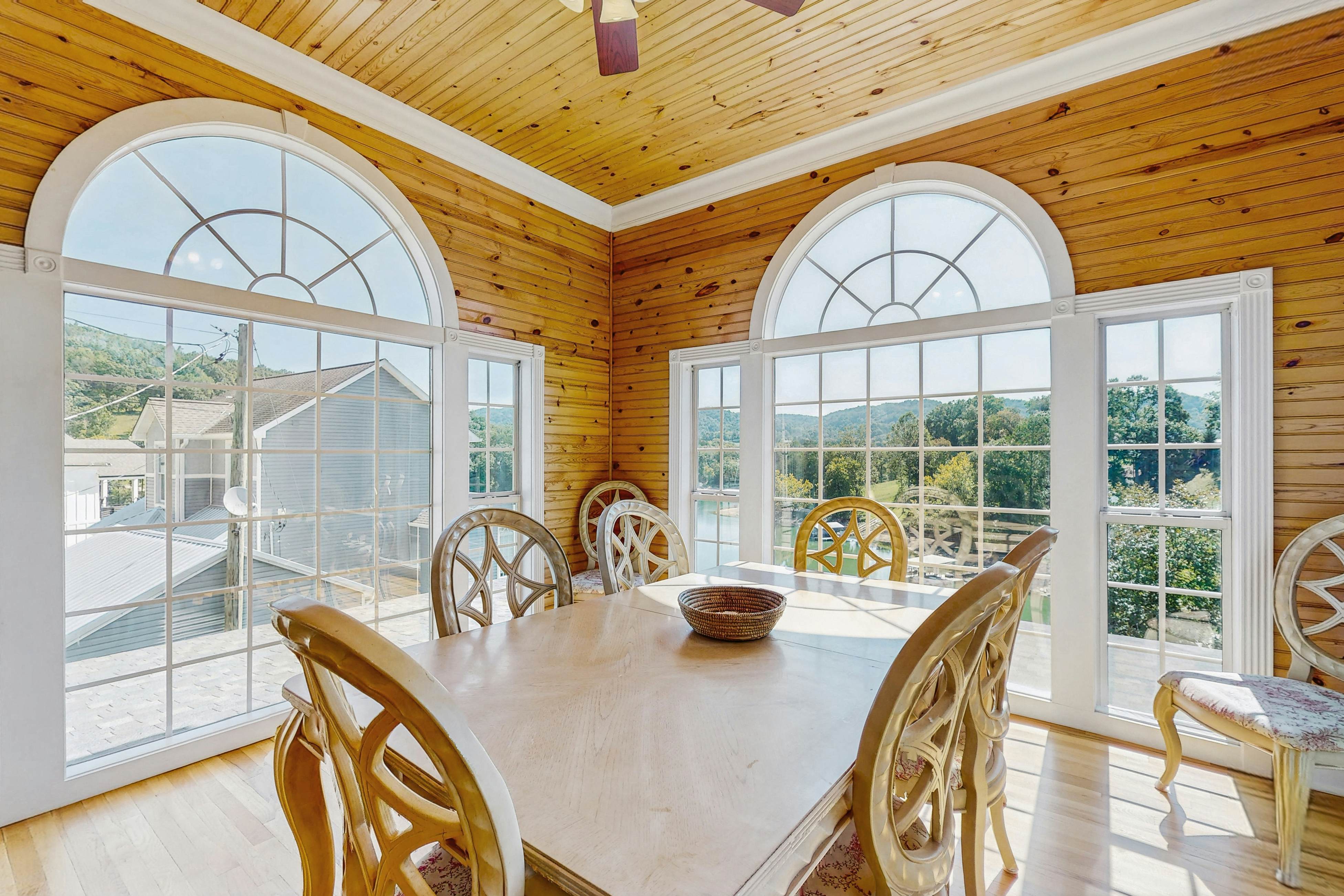 Stunning lake front home w/dock, card tables, wet bar, fire pit & amazing views!