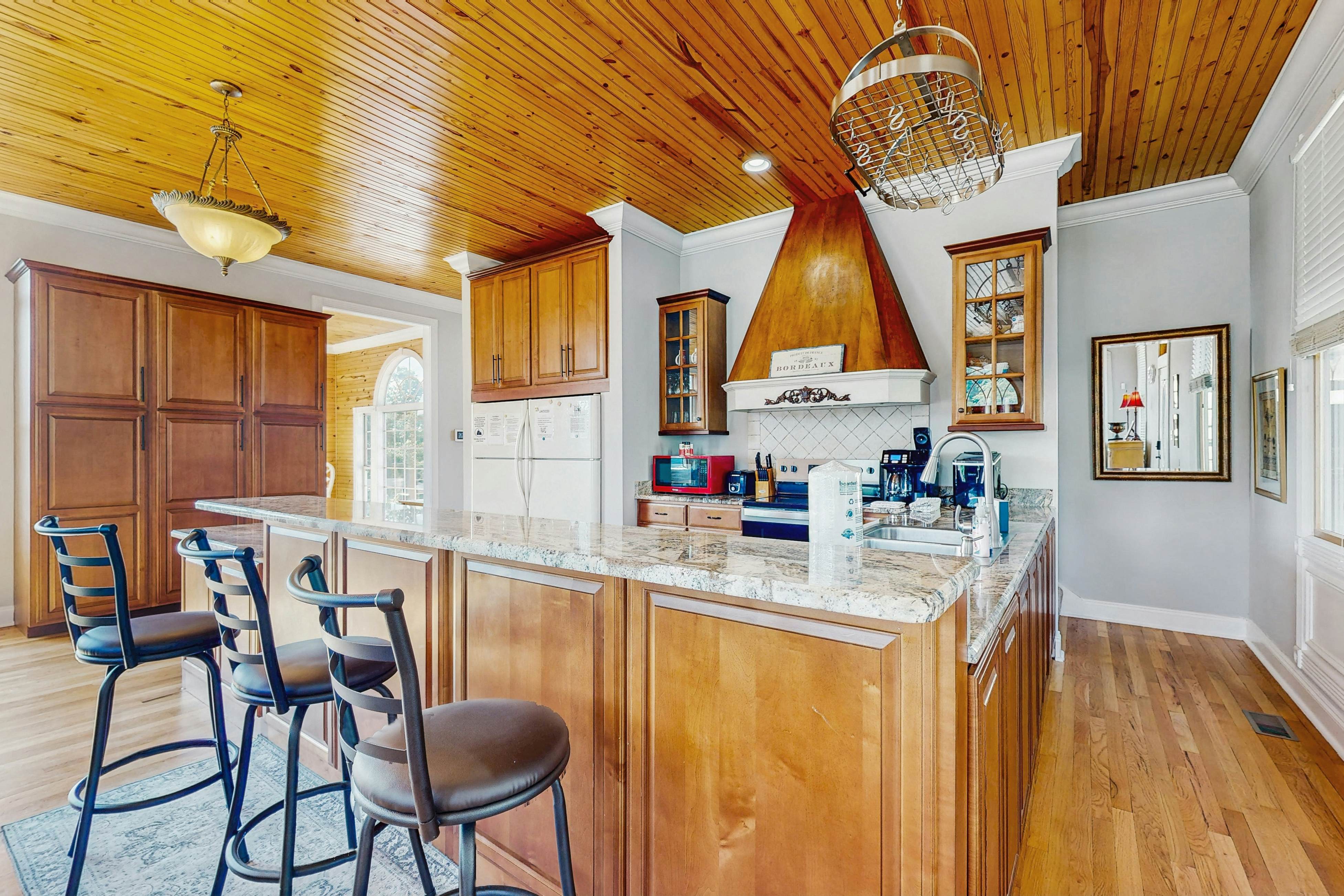 Stunning lake front home w/dock, card tables, wet bar, fire pit & amazing views!