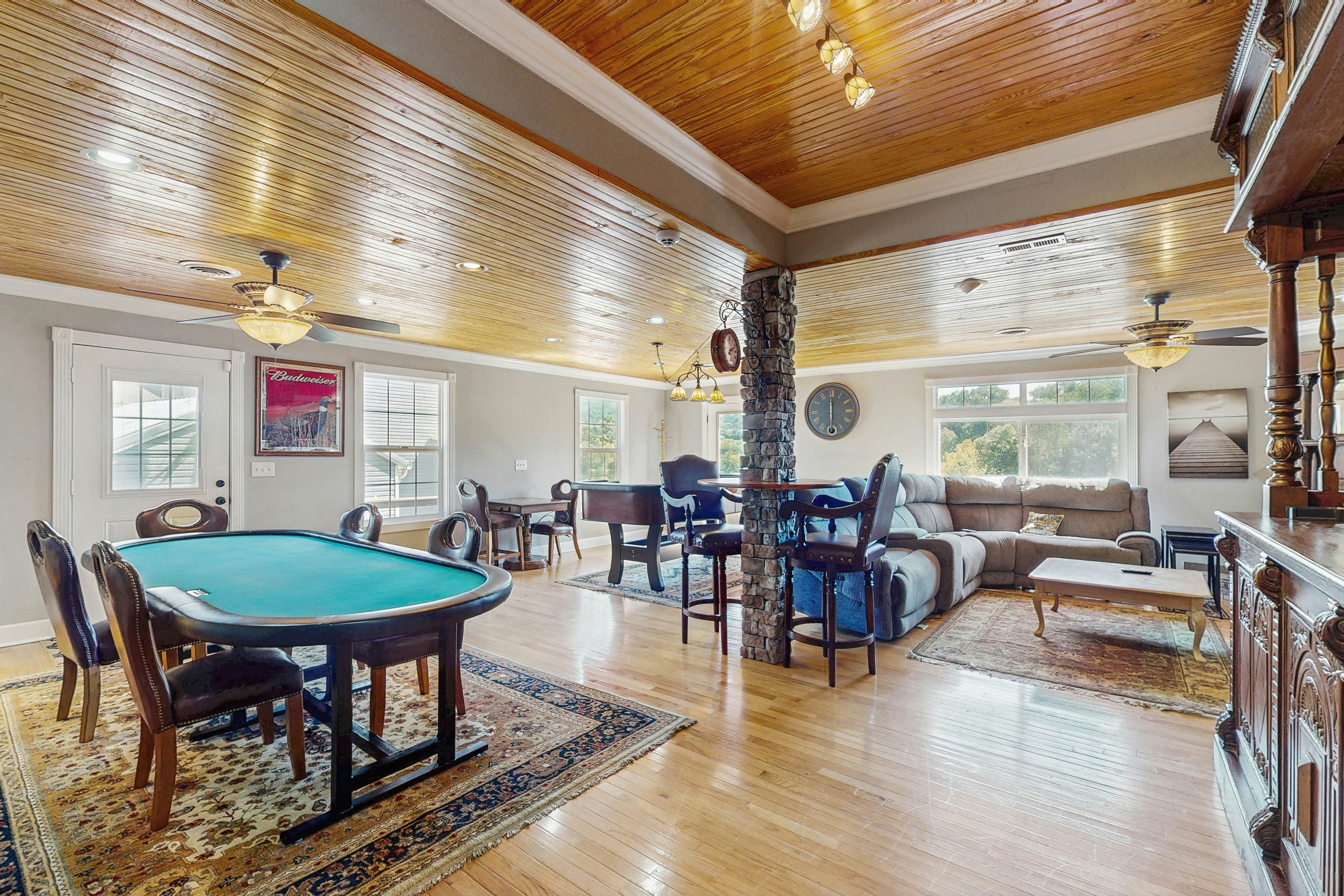 Stunning lake front home w/dock, card tables, wet bar, fire pit & amazing views!