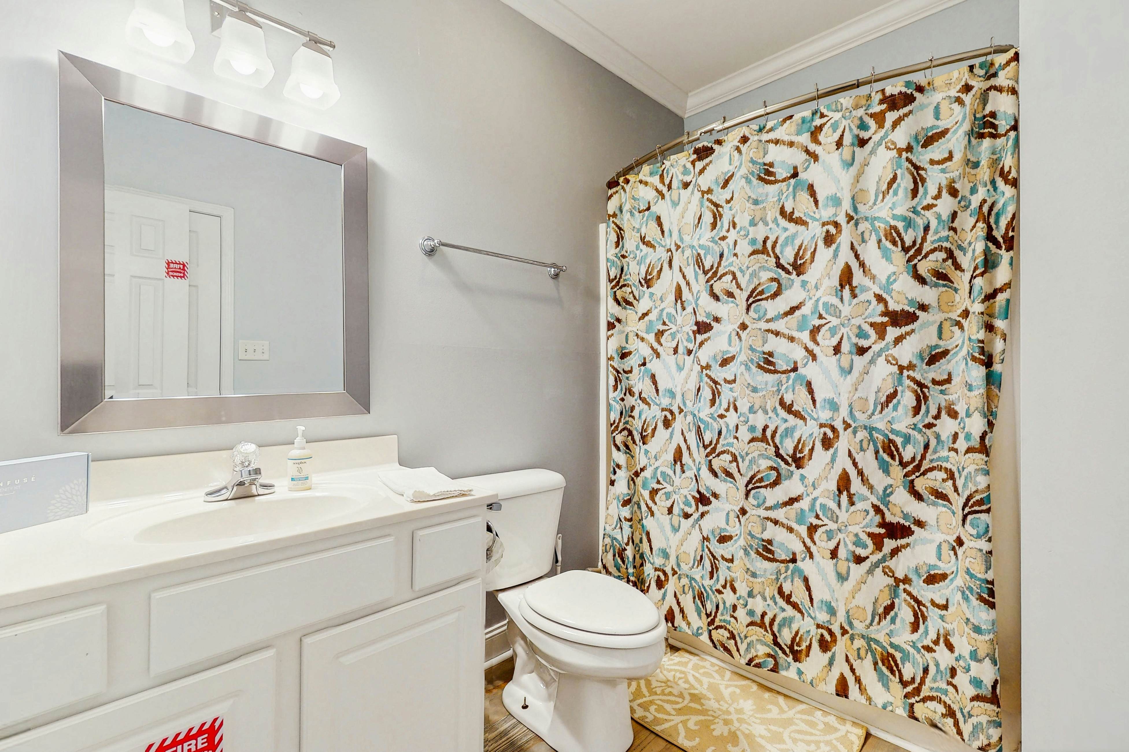 Stunning lake front home w/dock, card tables, wet bar, fire pit & amazing views!