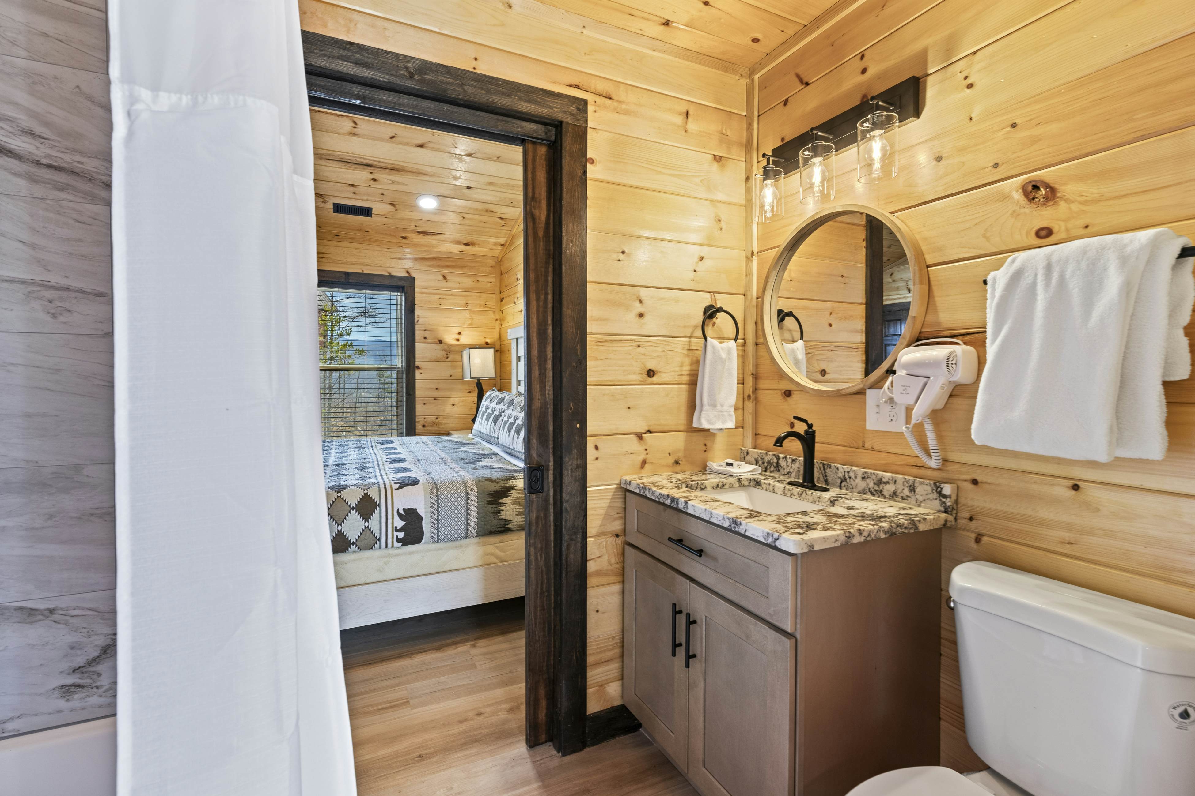 Lovely cabin with tons of amenities, pool, hot tub, theater, pool table, et al!