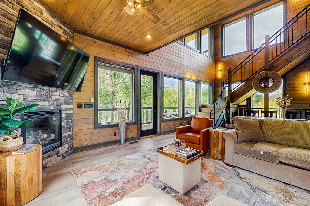 🌄 Rocky Top Ridge Retreat

Welcome to this 4 bedroom, 3.5 bathroom Gatlinburg cabin, where mountain views and roomy gathering spaces make group stays easy.

・Soak in the private hot tub on the deck
・Gather in the game room for friendly competition
・Cook and dine together with a full kitchen and large table
・1.2 miles to Ripley's Aquarium of the Smokies and The Village Shops

Settle in, spread out, and enjoy a Smoky Mountain stay that feels built for family time.