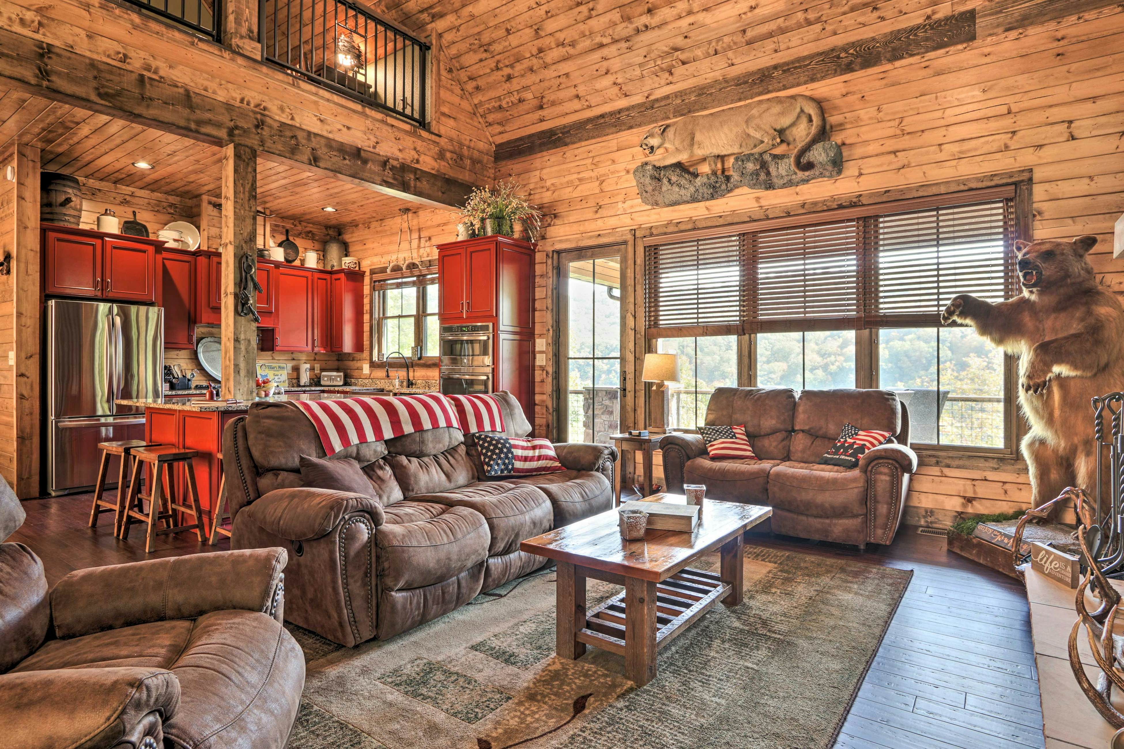 Lakefront cabin with fire pit, lift down to the dock, hot tub, bean bag toss